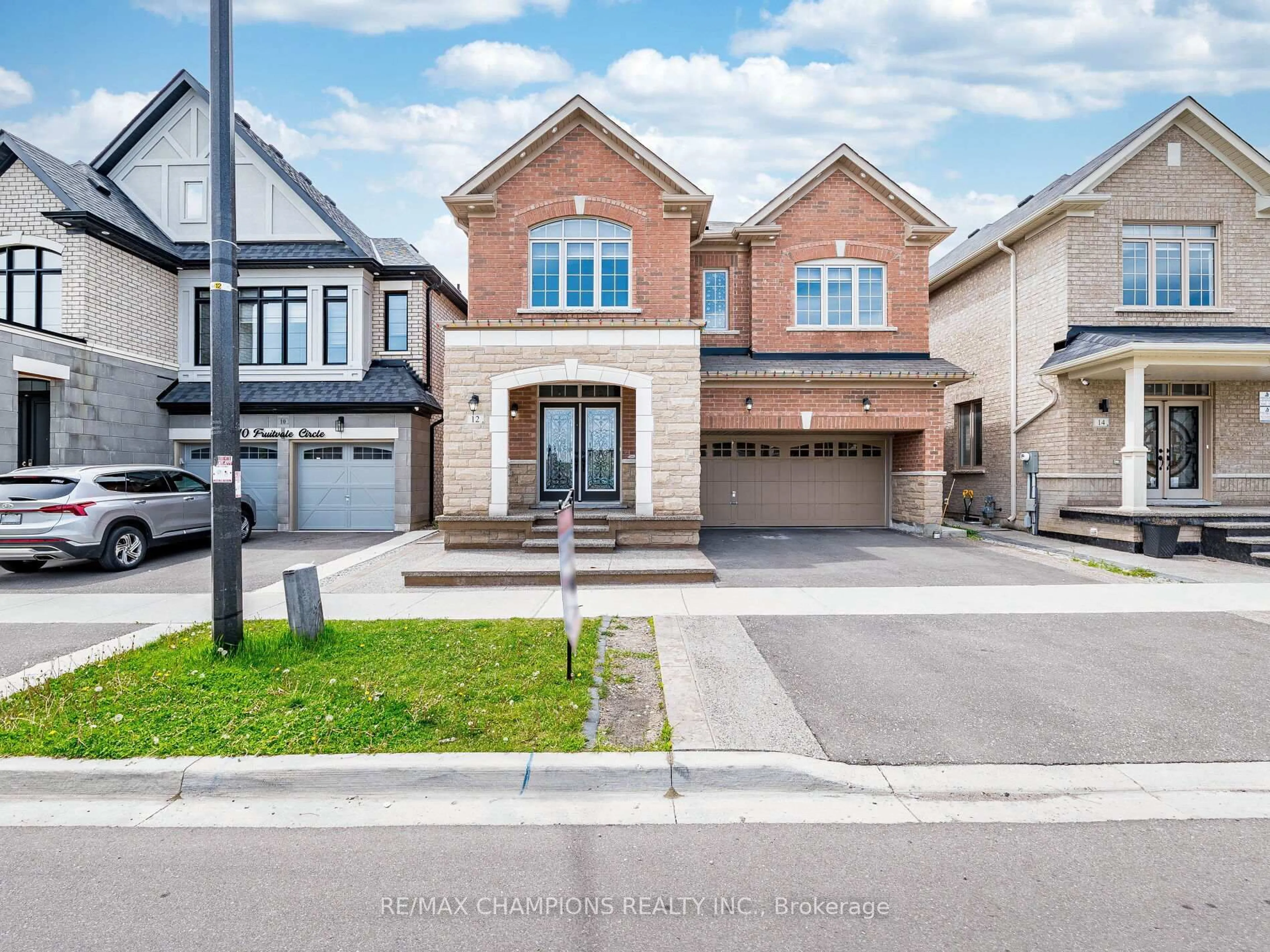Home with brick exterior material, street for 12 Fruitvale Circ, Brampton Ontario L7A 5B8