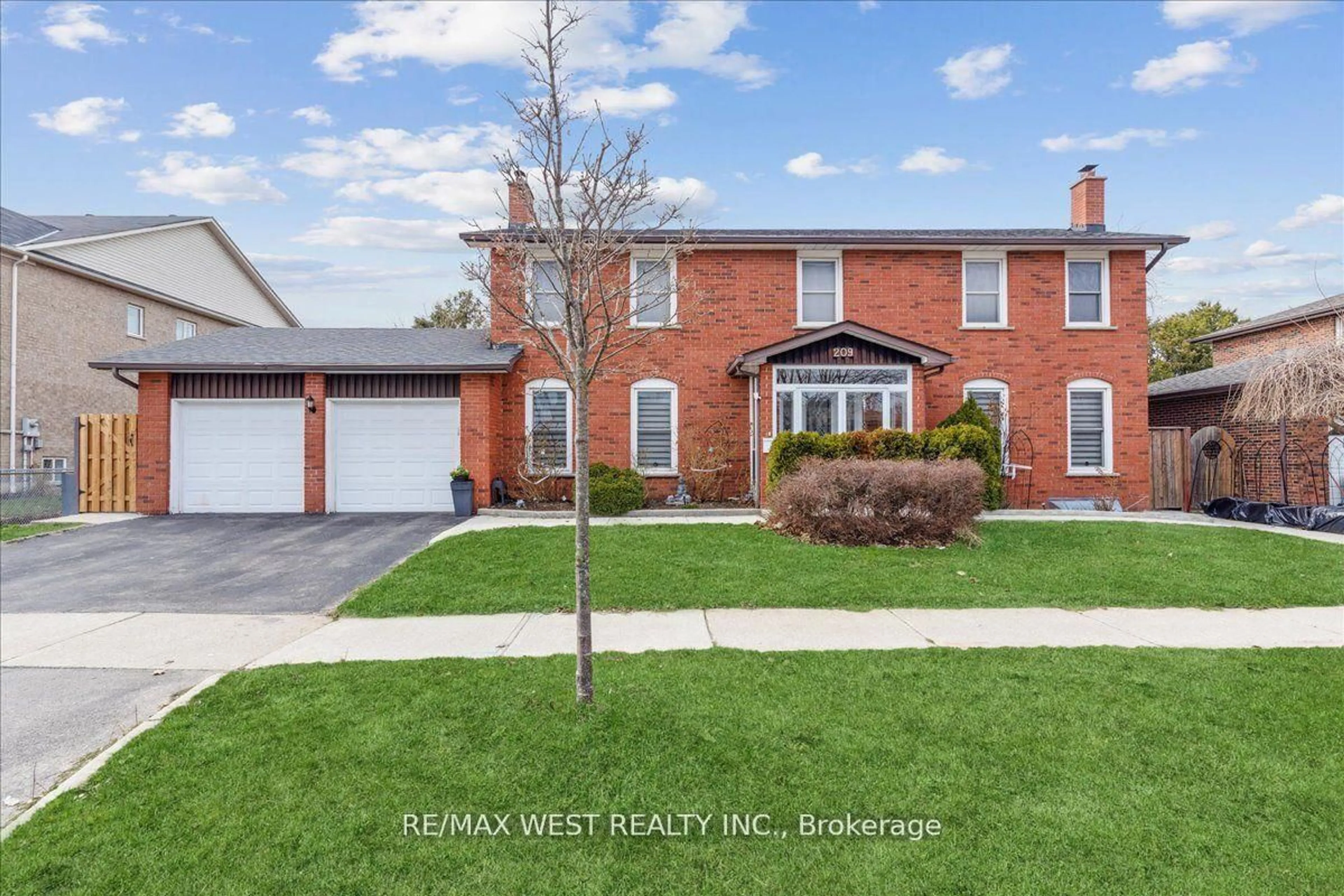 Home with brick exterior material, street for 209 Louis Dr, Mississauga Ontario L5B 2V5