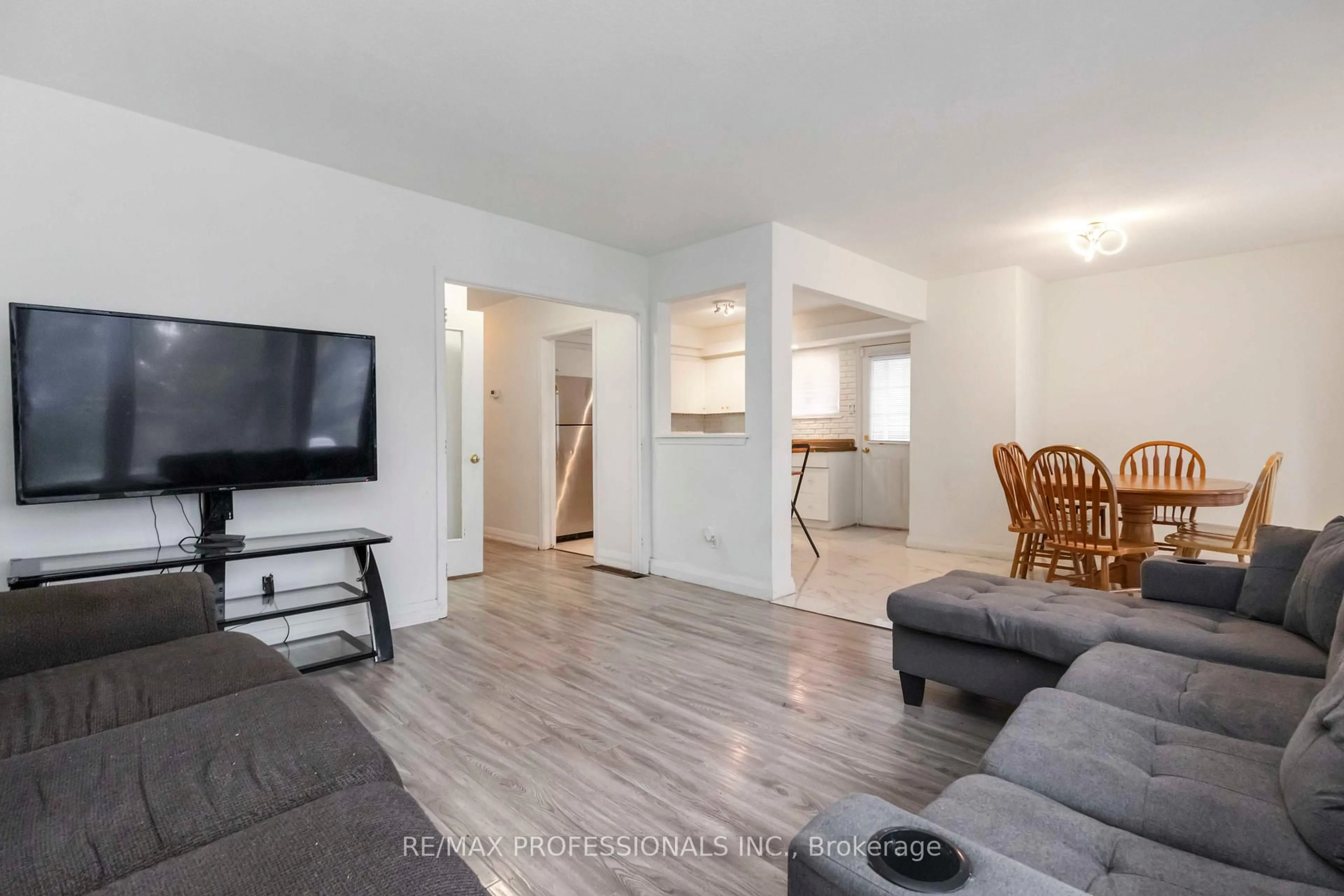 Living room with furniture, unknown for 21 Caulfield Rd, Toronto Ontario M9W 1X1