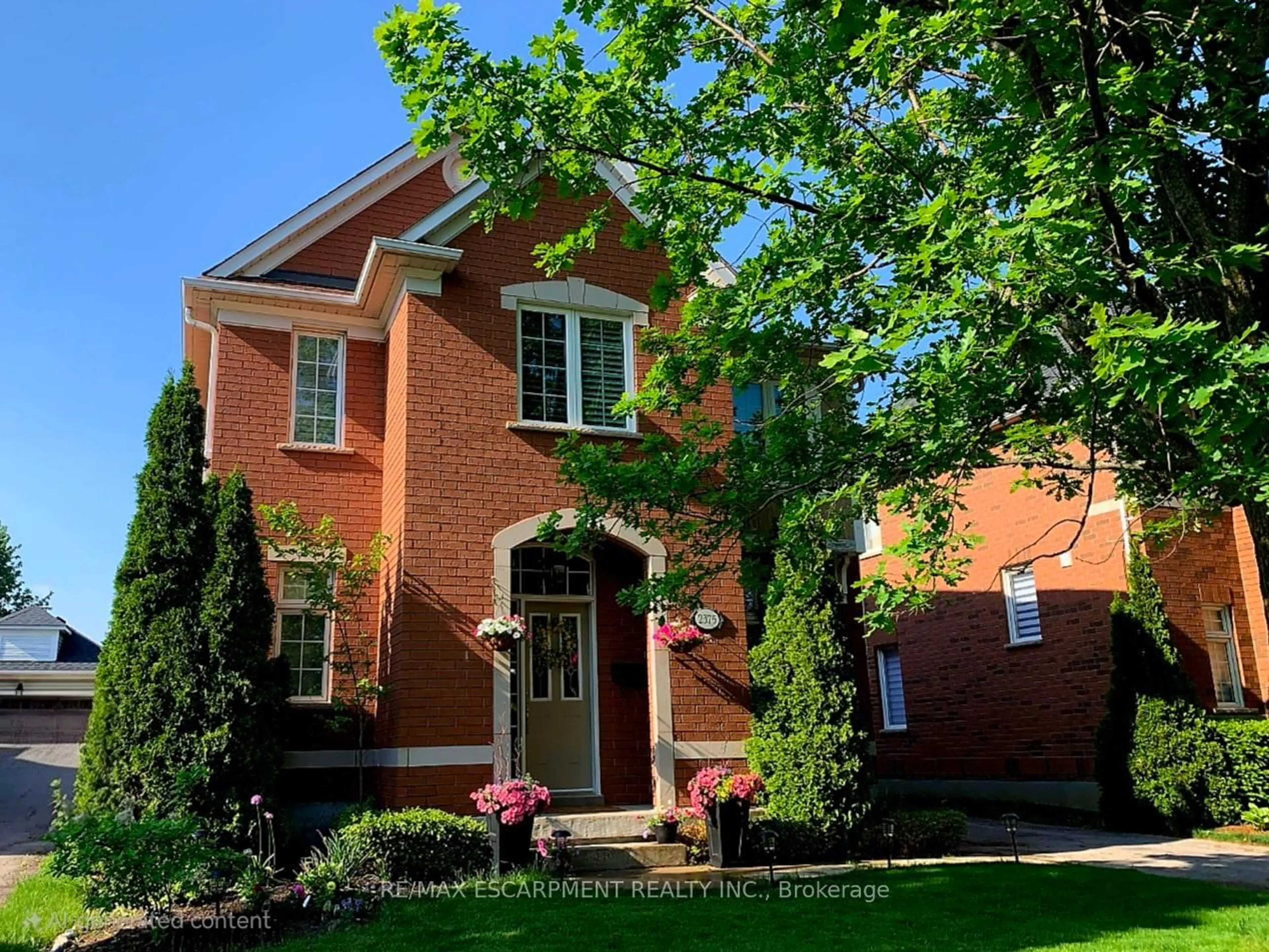 Home with brick exterior material, street for 2375 Ennerdale Rd, Oakville Ontario L6H 6N5