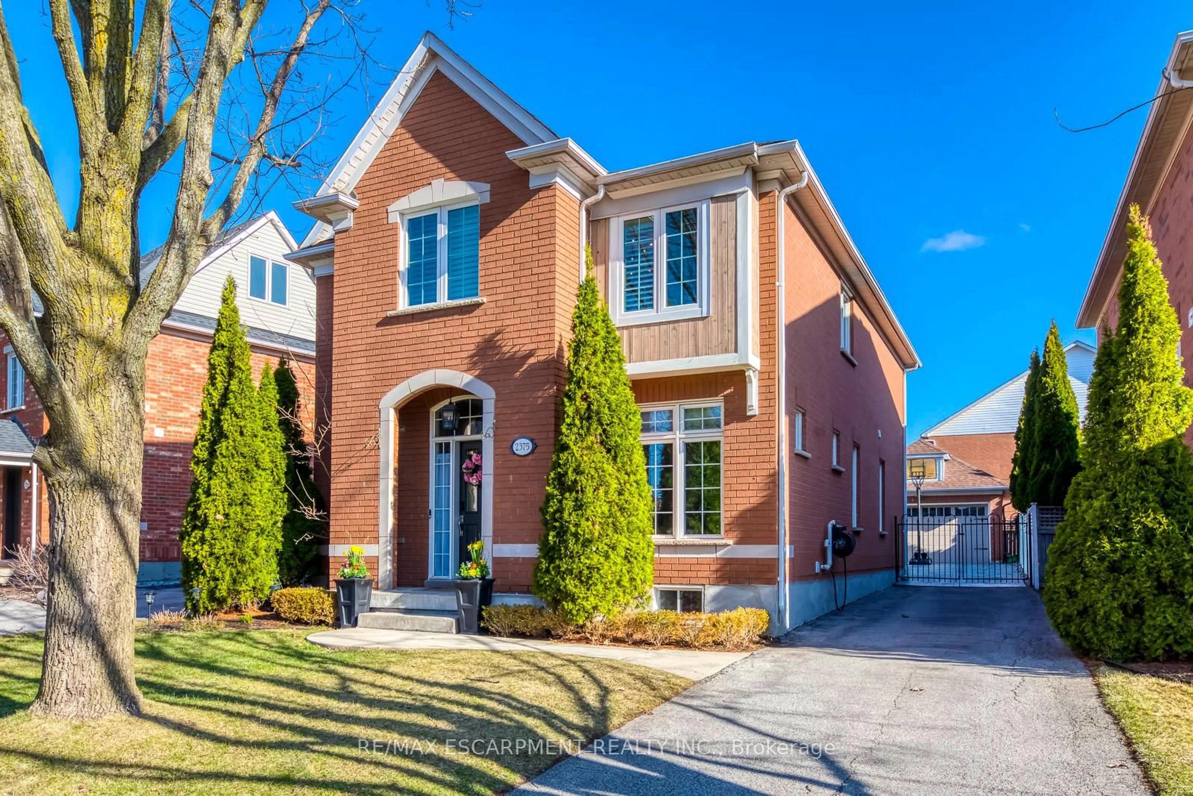 Home with brick exterior material, street for 2375 Ennerdale Rd, Oakville Ontario L6H 6N5