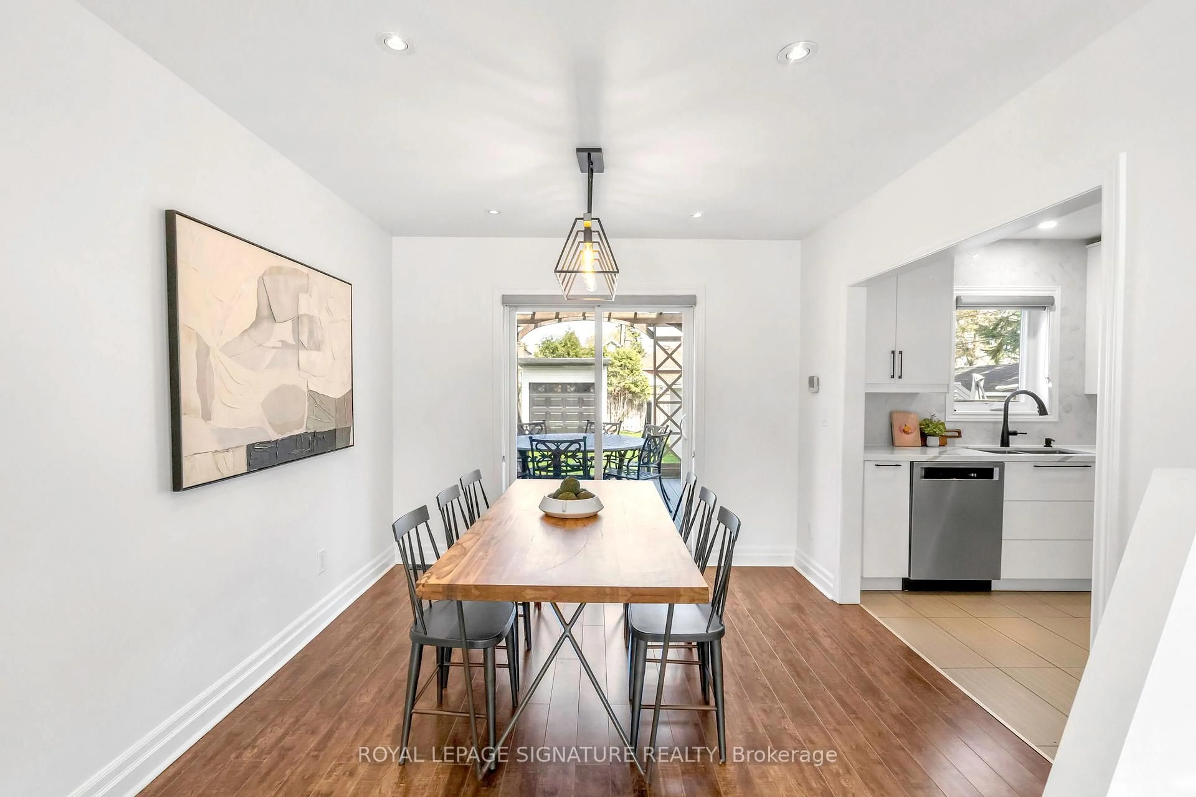 Dining room, wood/laminate floor for 33 Nineteenth St, Toronto Ontario M8V 3L4