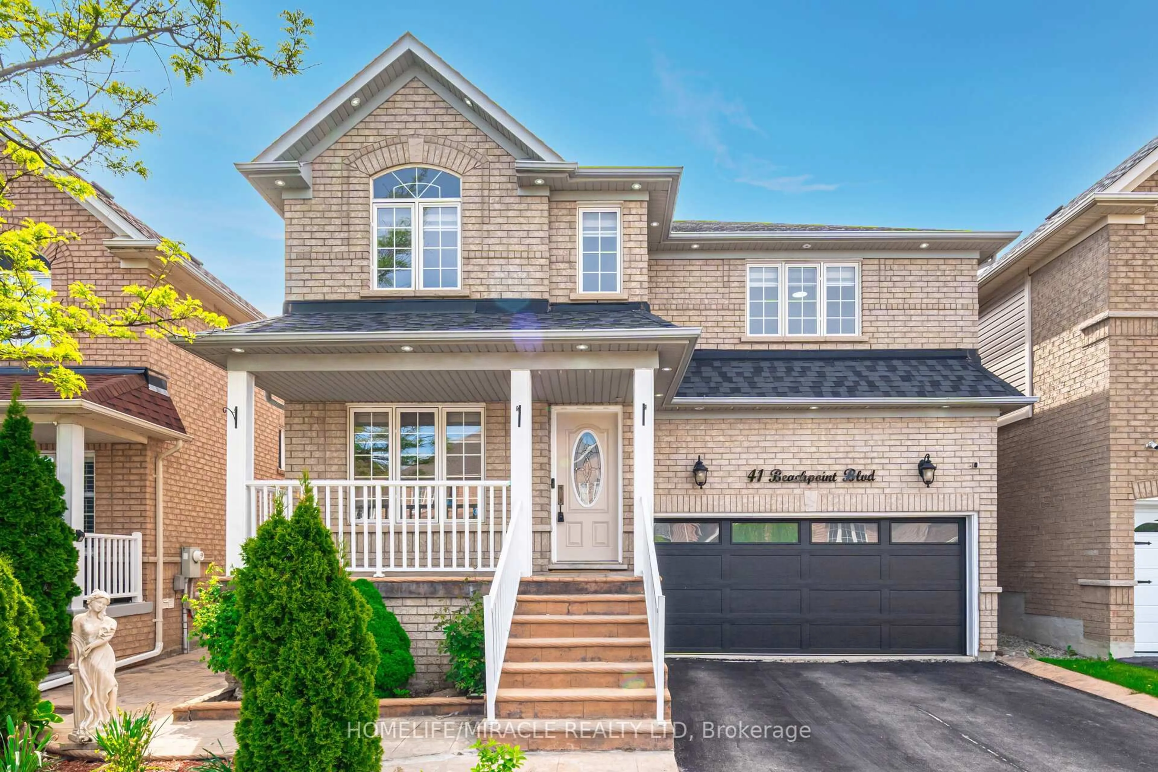 Home with brick exterior material, street for 41 Beachpoint Blvd, Brampton Ontario L7A 2T7