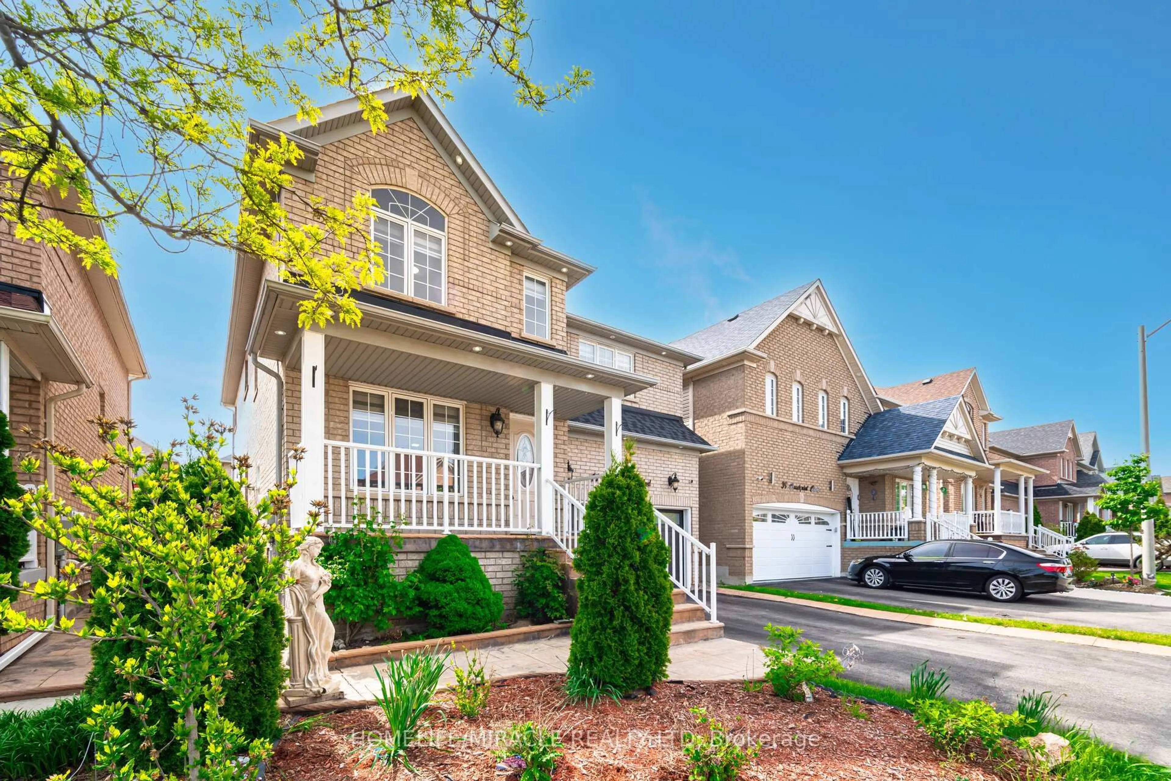 Home with vinyl exterior material, street for 41 Beachpoint Blvd, Brampton Ontario L7A 2T7