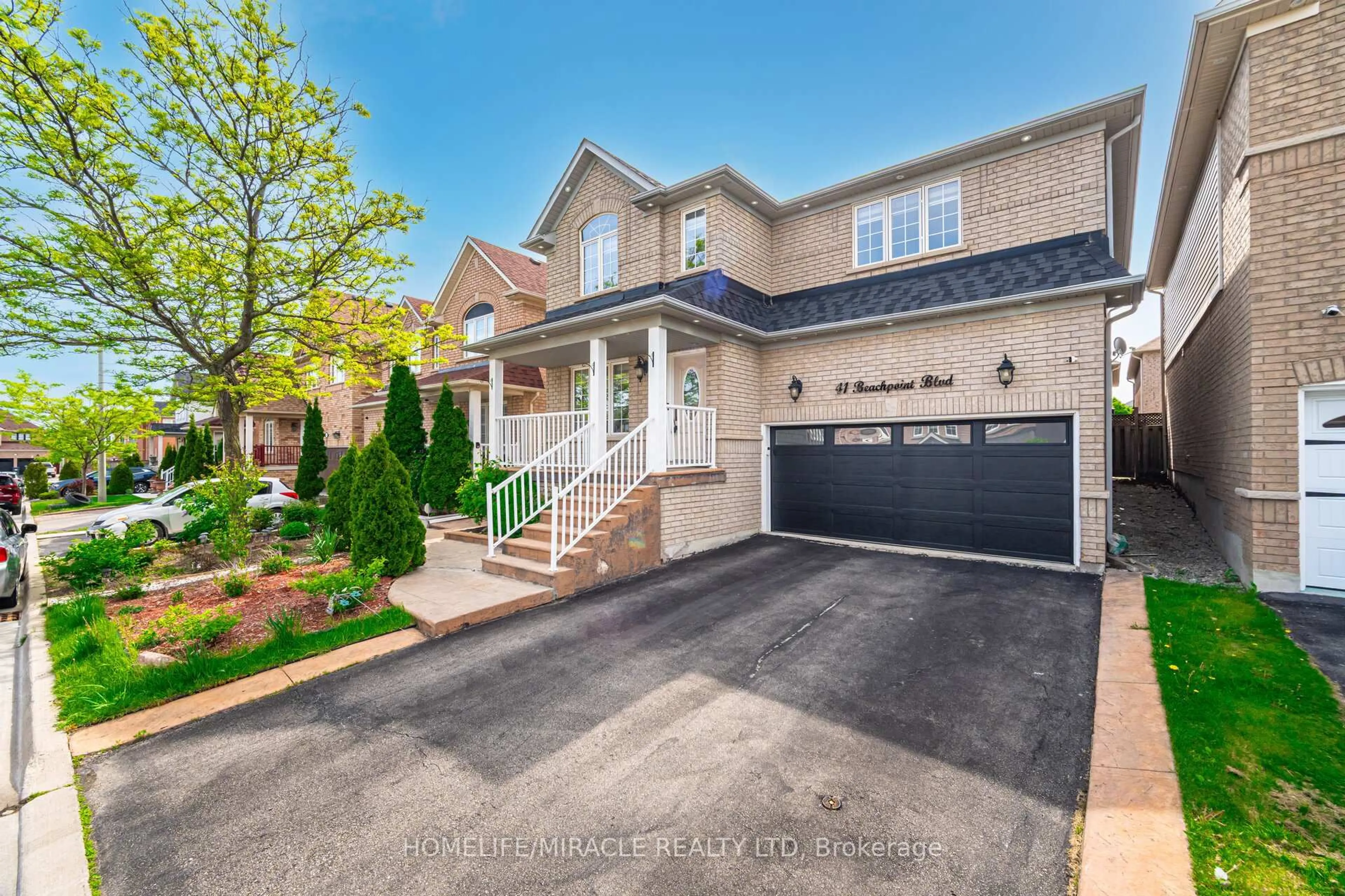 Home with brick exterior material, street for 41 Beachpoint Blvd, Brampton Ontario L7A 2T7