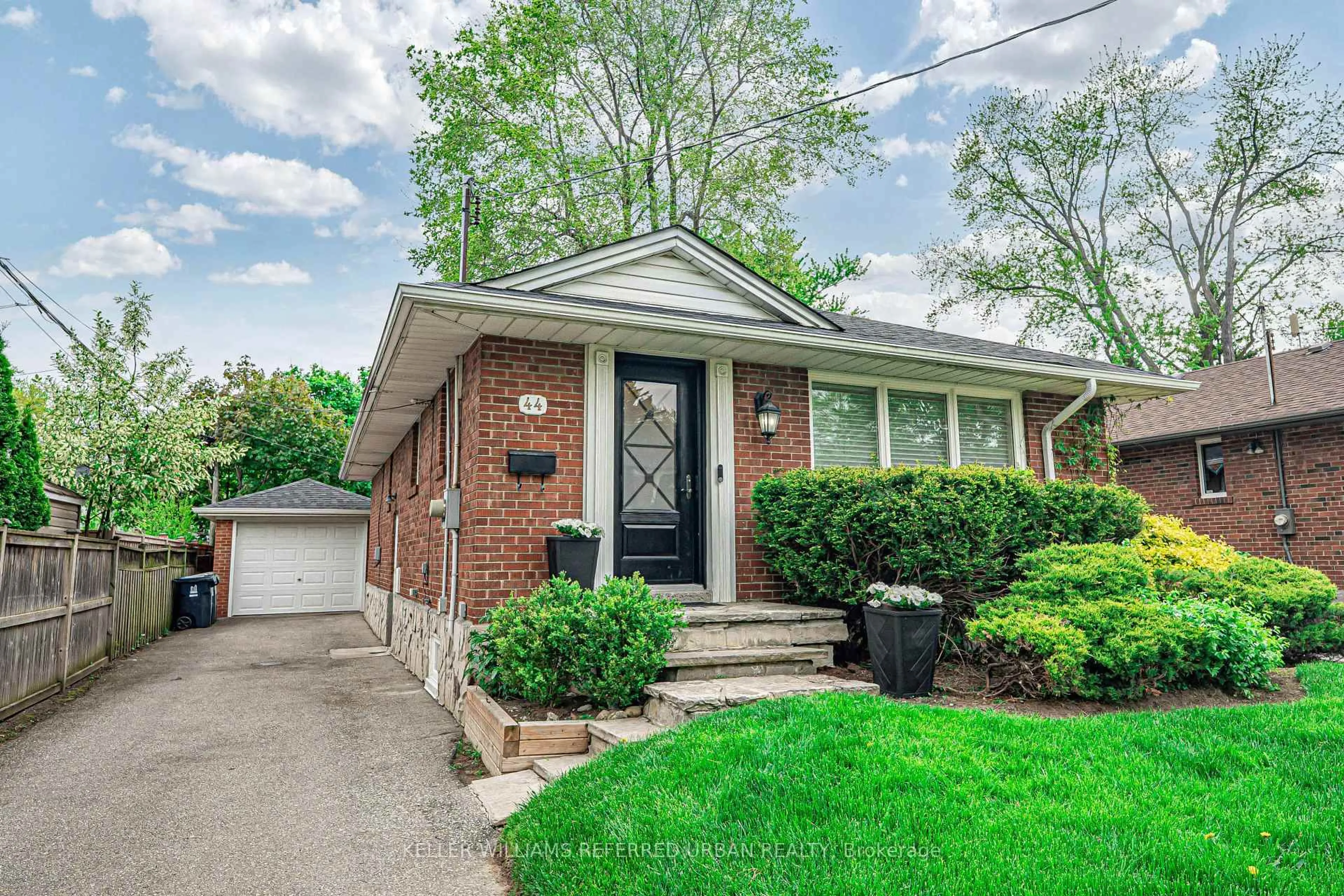 Home with brick exterior material, street for 44 Burnelm Dr, Toronto Ontario M6B 4N3