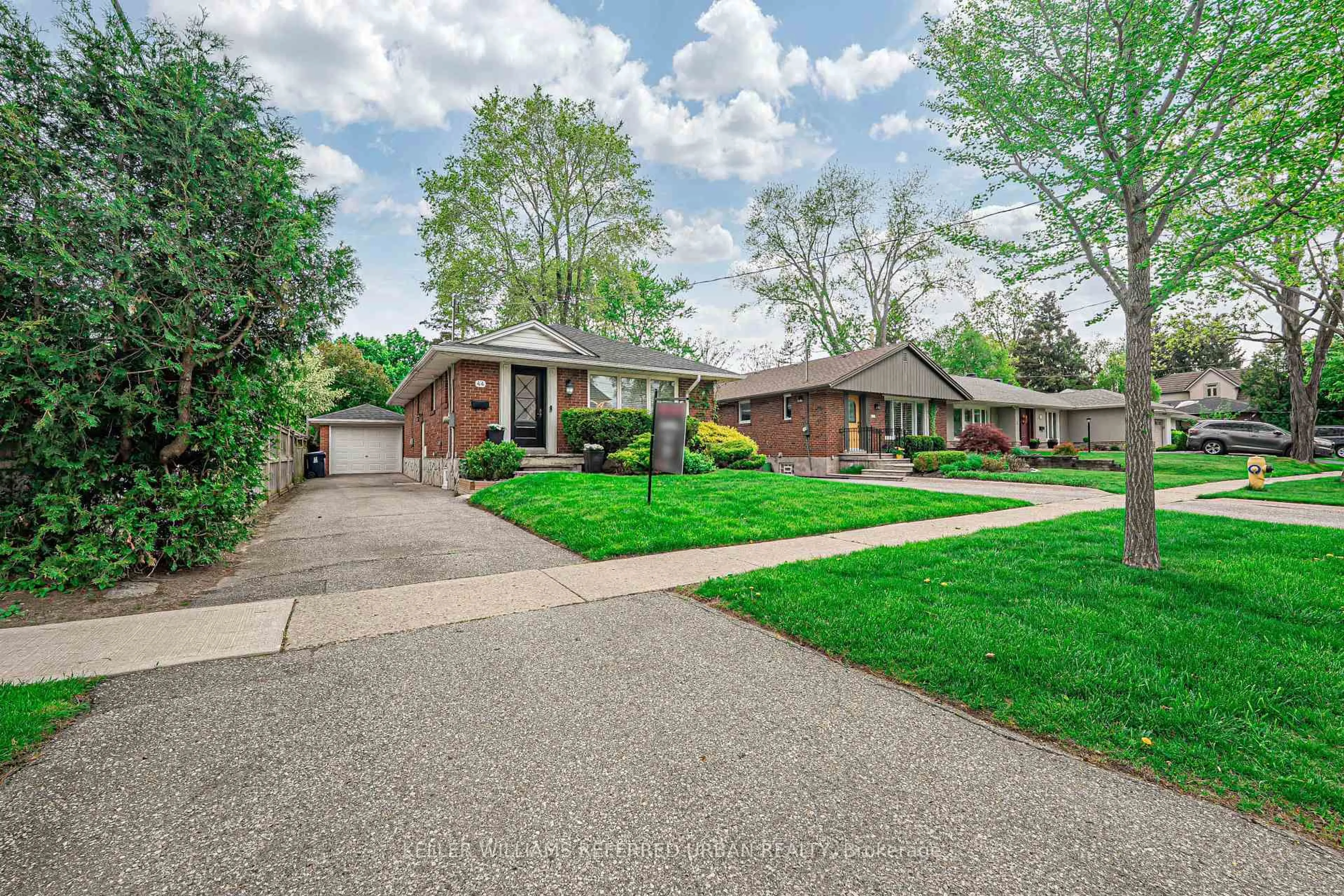 Home with brick exterior material, street for 44 Burnelm Dr, Toronto Ontario M6B 4N3