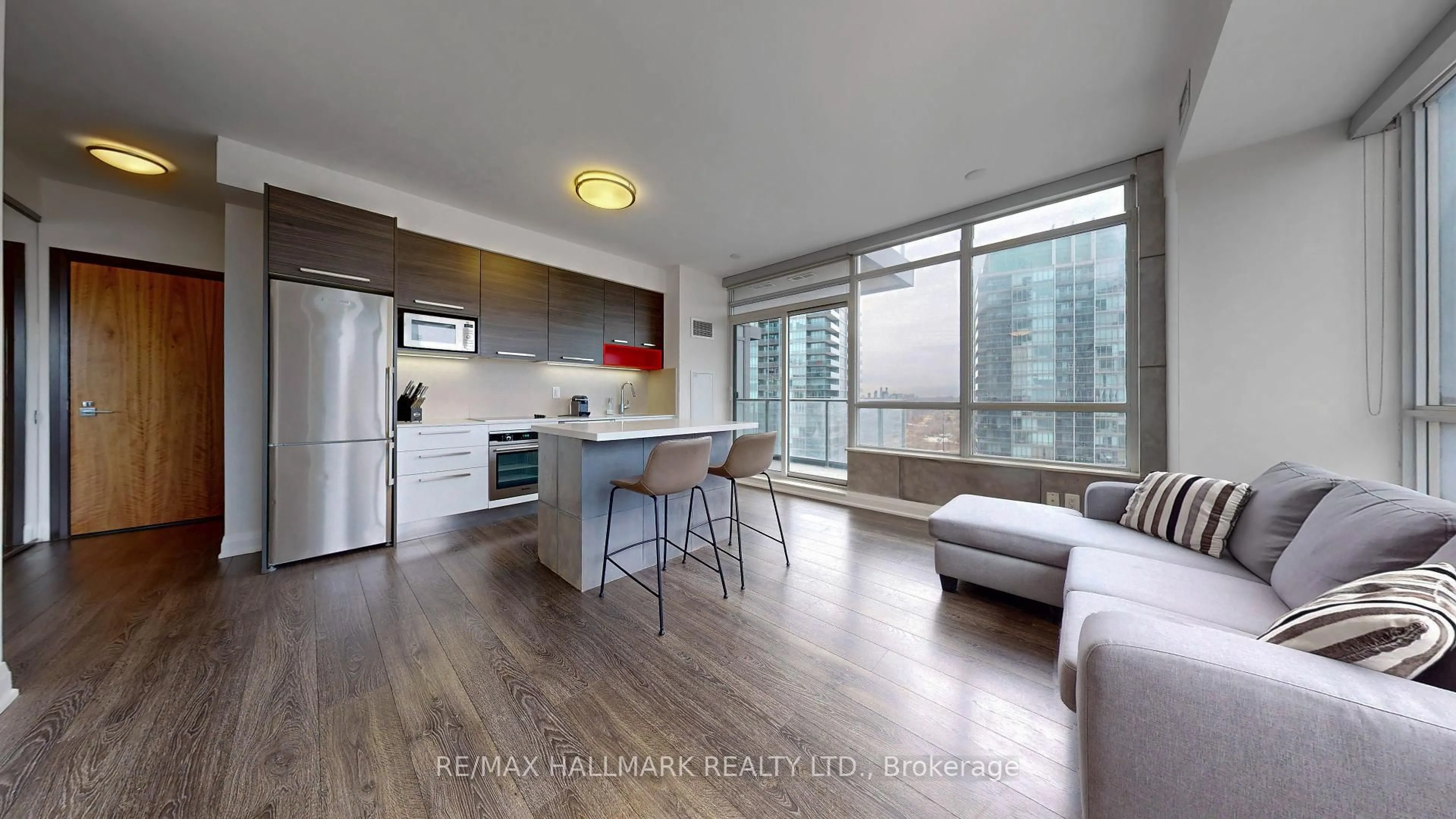 Open concept kitchen, wood/laminate floor for 36 Park Lawn Rd #1909, Toronto Ontario M8V 0E5