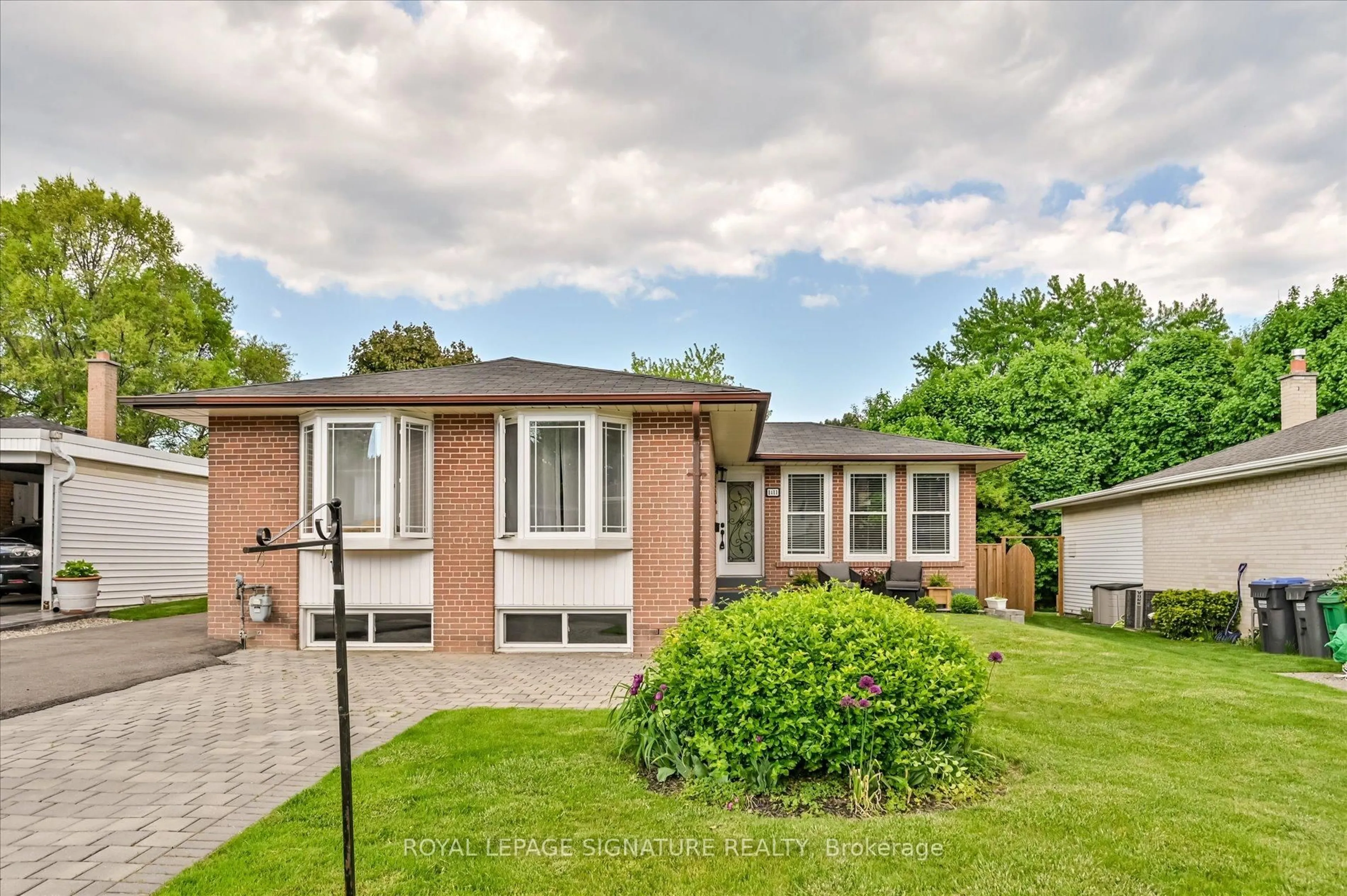 Home with brick exterior material, street for 1411 Lewisham Dr, Mississauga Ontario L5J 3R2
