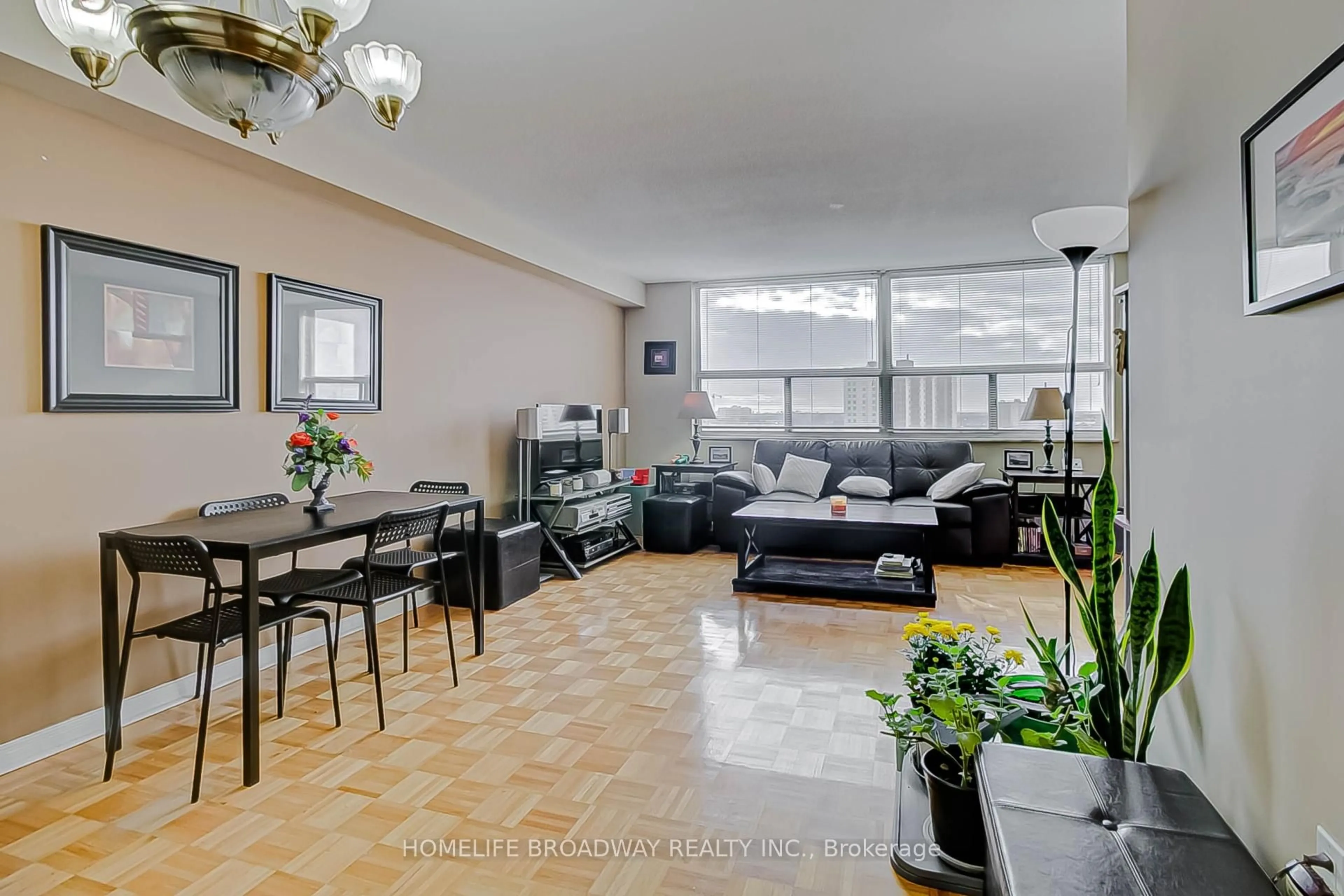 Living room with furniture, unknown for 10 Tobermory Dr #1006, Toronto Ontario M3N 2Y5