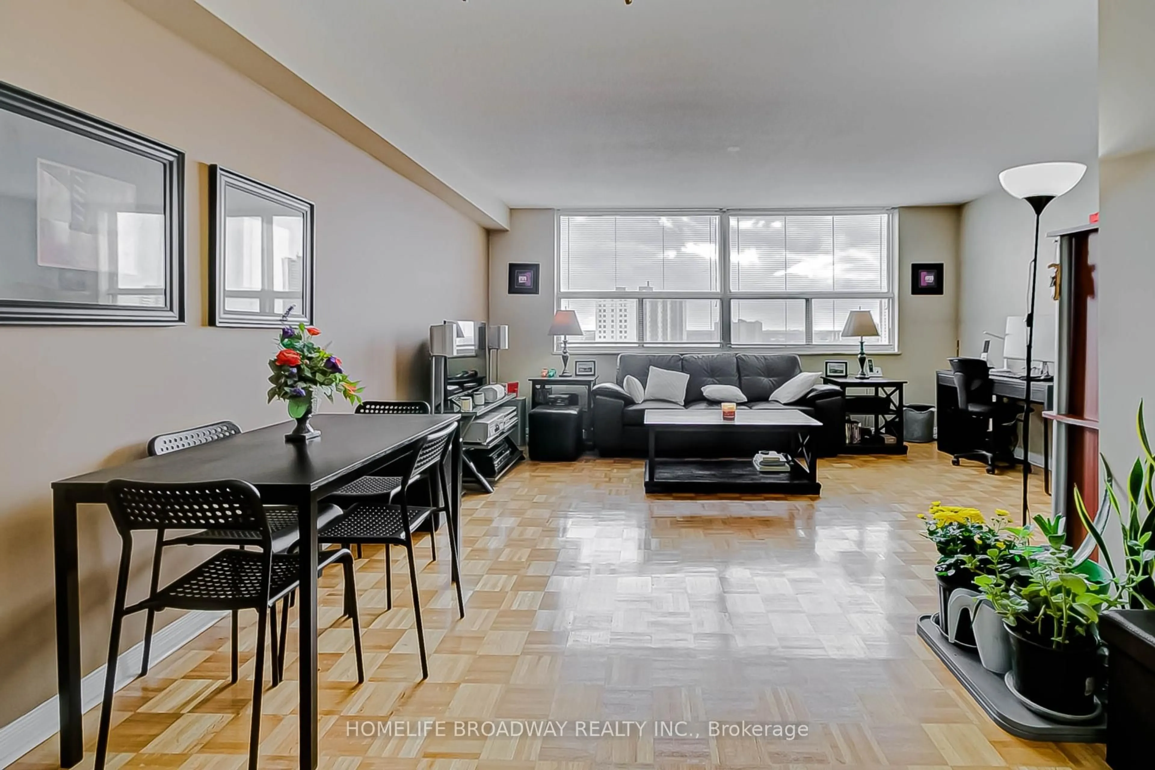 Living room with furniture, unknown for 10 Tobermory Dr #1006, Toronto Ontario M3N 2Y5