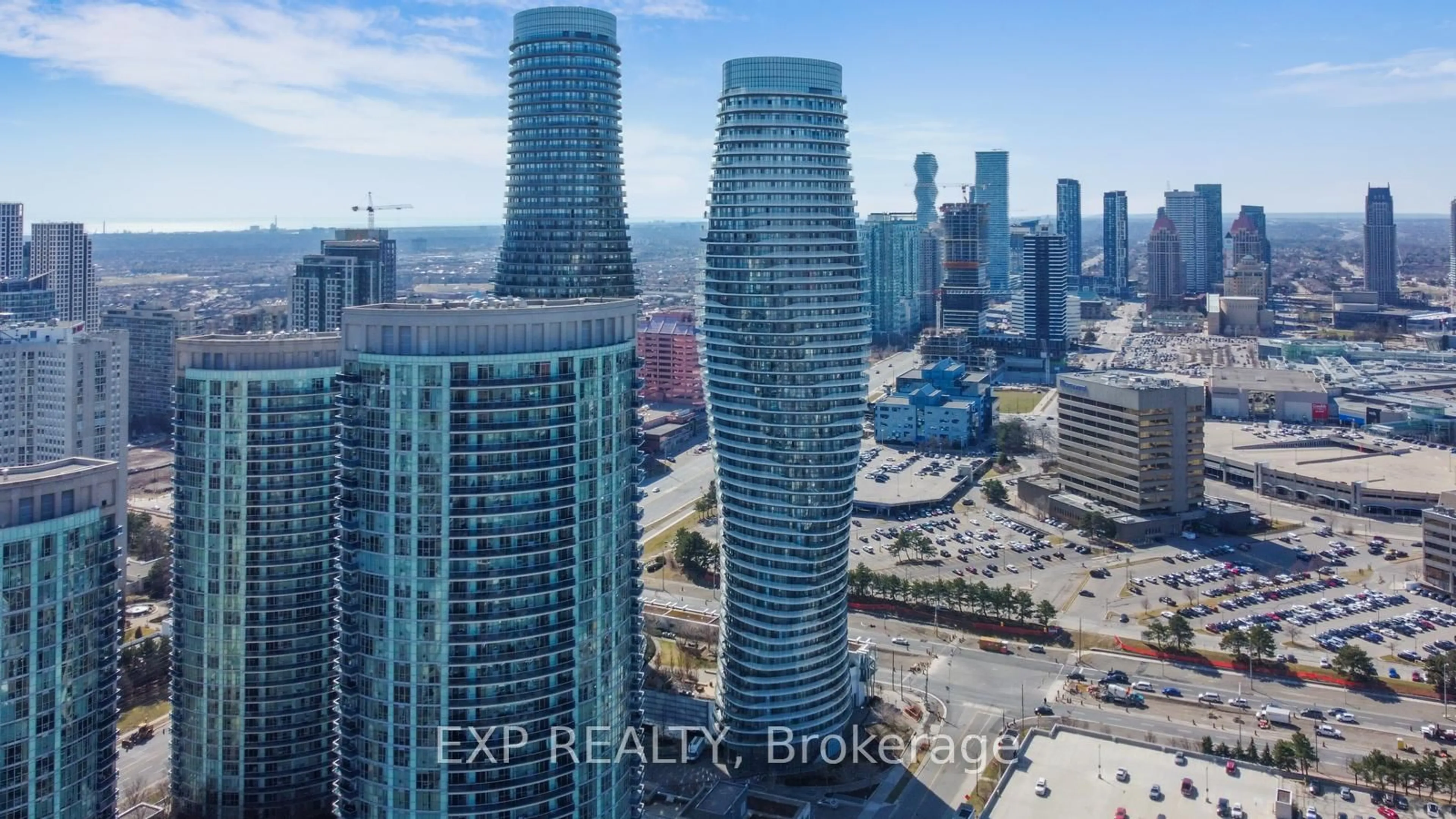 A pic from outside/outdoor area/front of a property/back of a property/a pic from drone, city buildings view from balcony for 80 Absolute Ave #3303, Mississauga Ontario L4Z 0A5