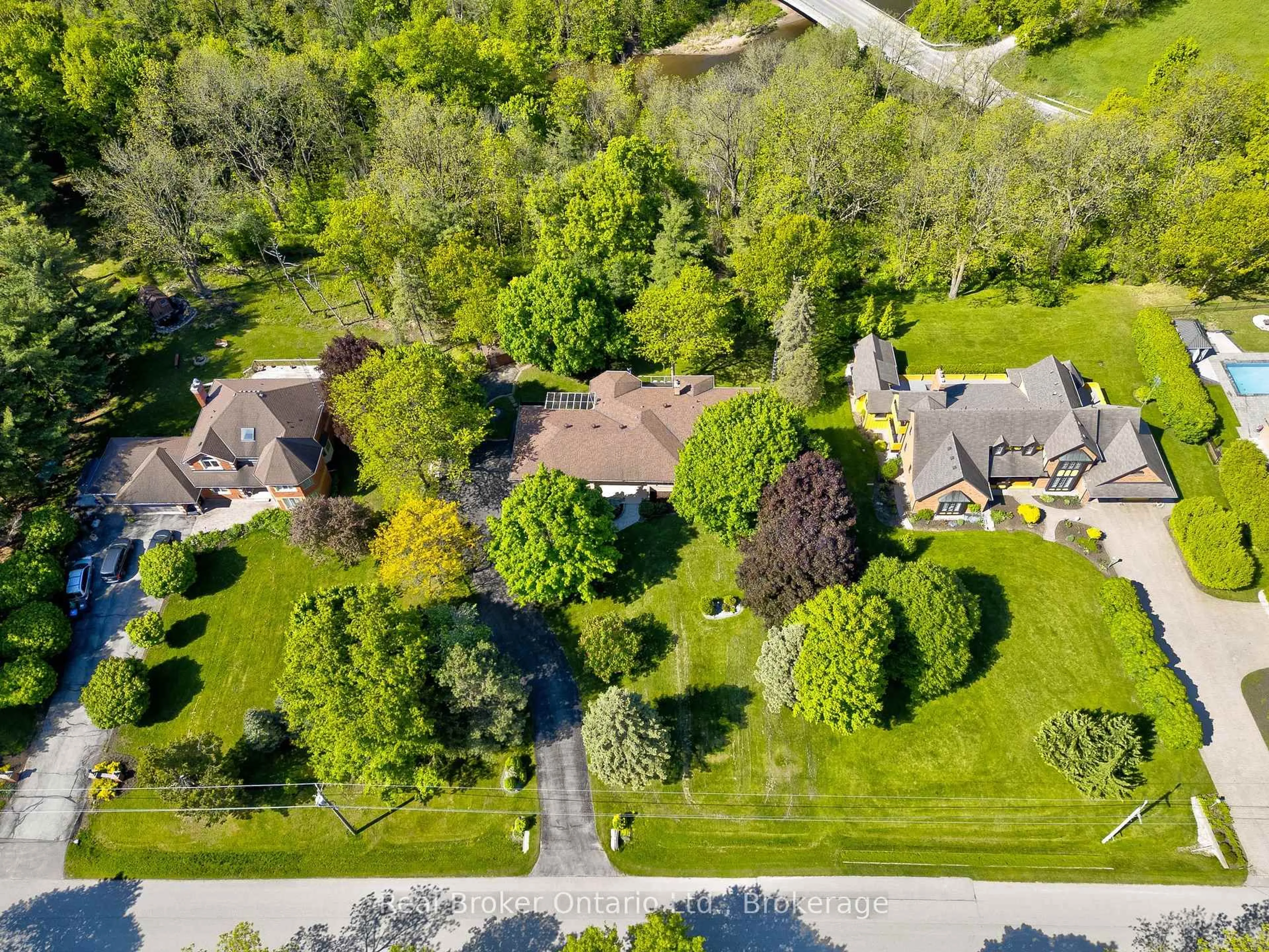 A pic from outside/outdoor area/front of a property/back of a property/a pic from drone, street for 10158 Old Pine Crest Rd, Halton Hills Ontario L0P 0A2
