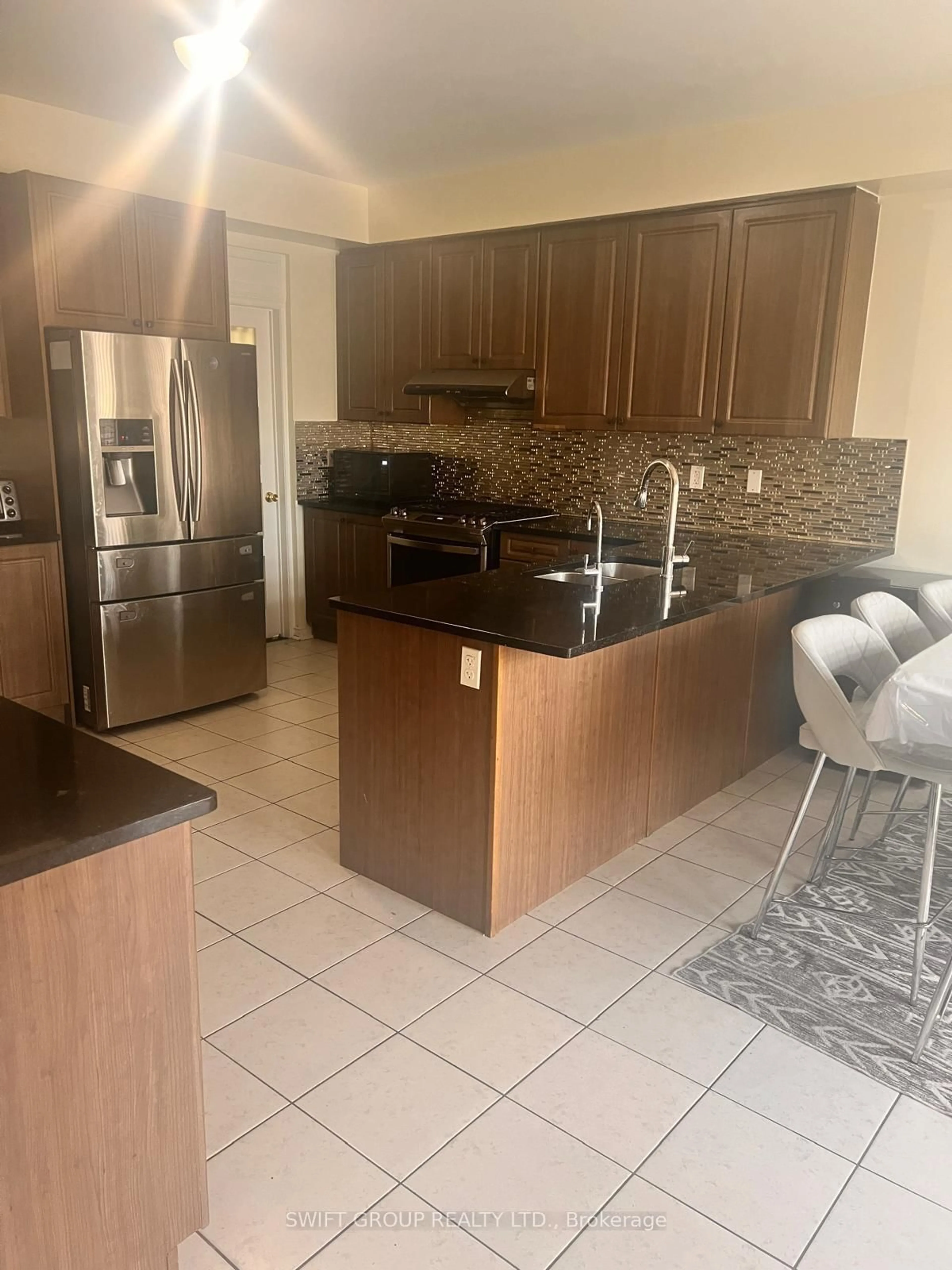 Open concept kitchen, ceramic/tile floor for 94 Checkerberry Cres, Brampton Ontario L6R 3P6