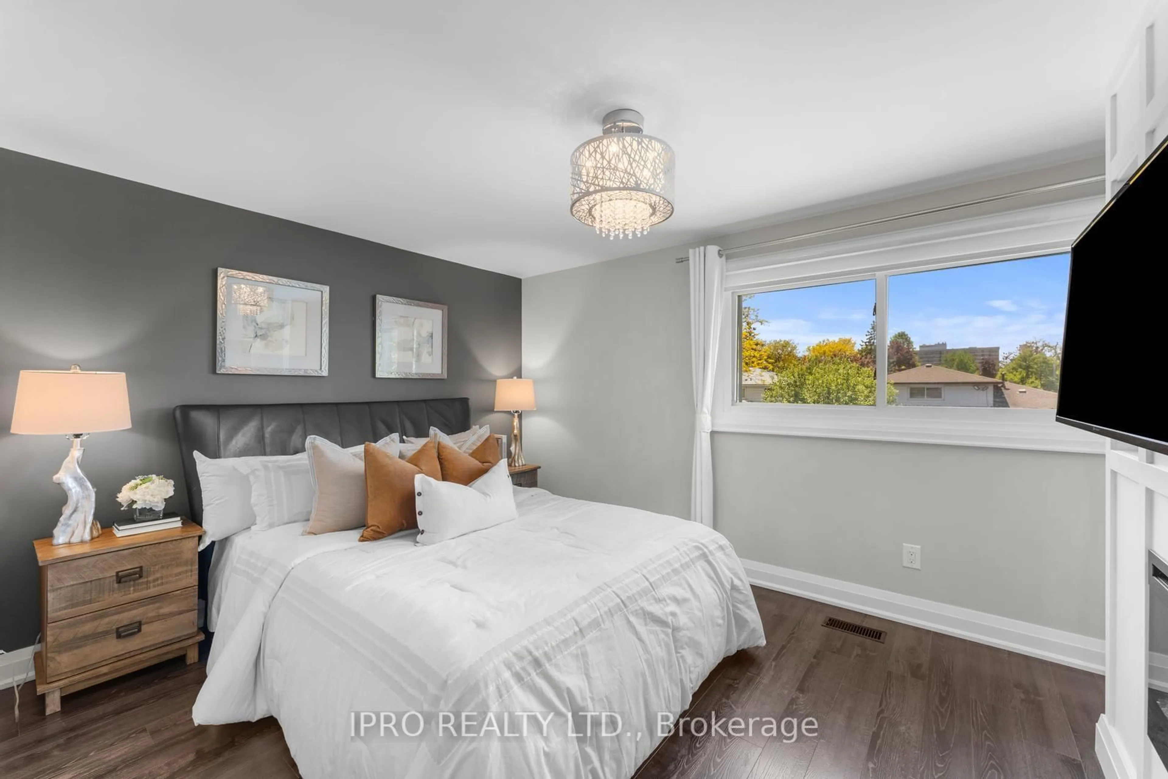 Bedroom with bed, wood/laminate floor for 132 Bartley Bull Pkwy, Brampton Ontario L6W 2J9