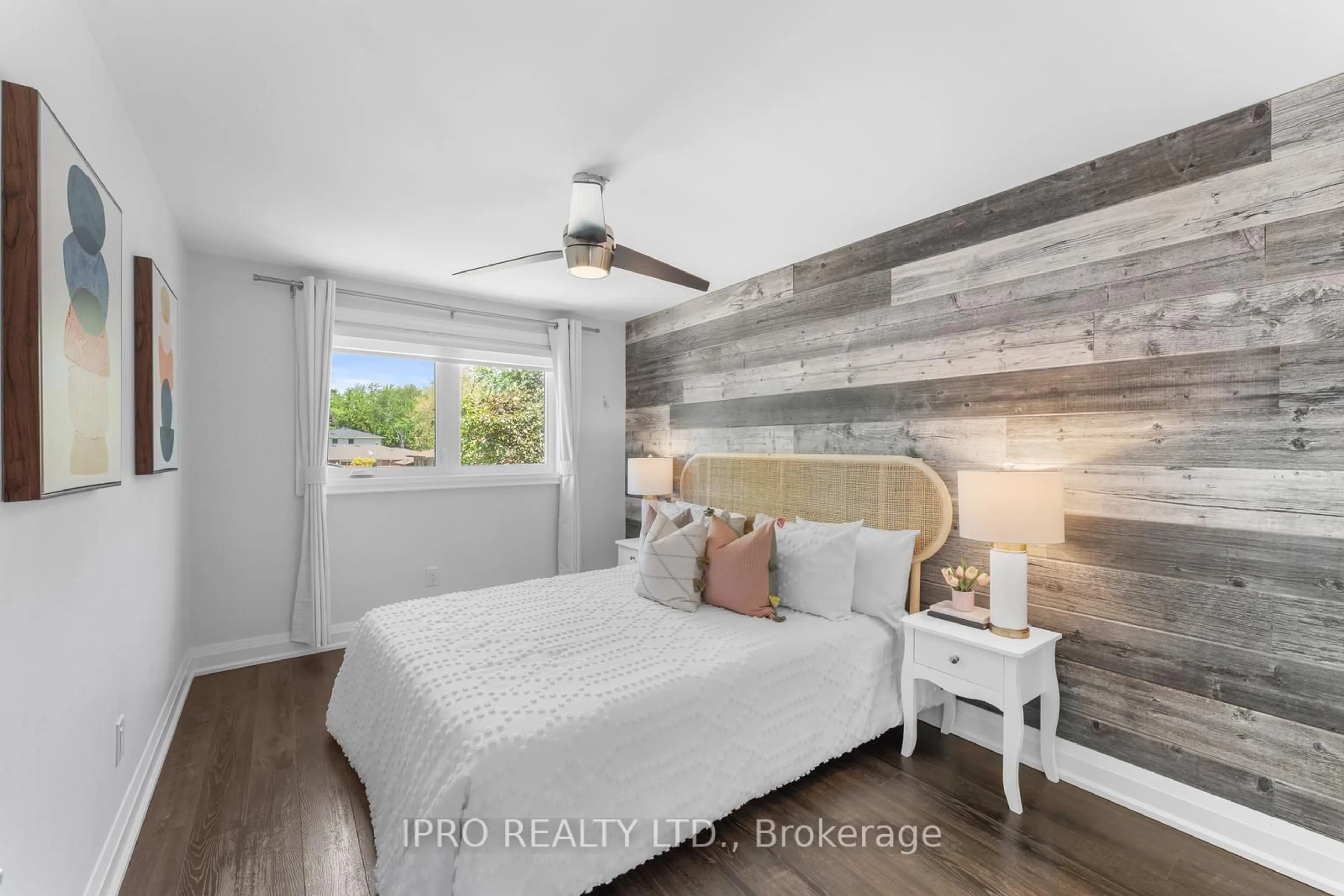 Bedroom with bed, wood/laminate floor for 132 Bartley Bull Pkwy, Brampton Ontario L6W 2J9