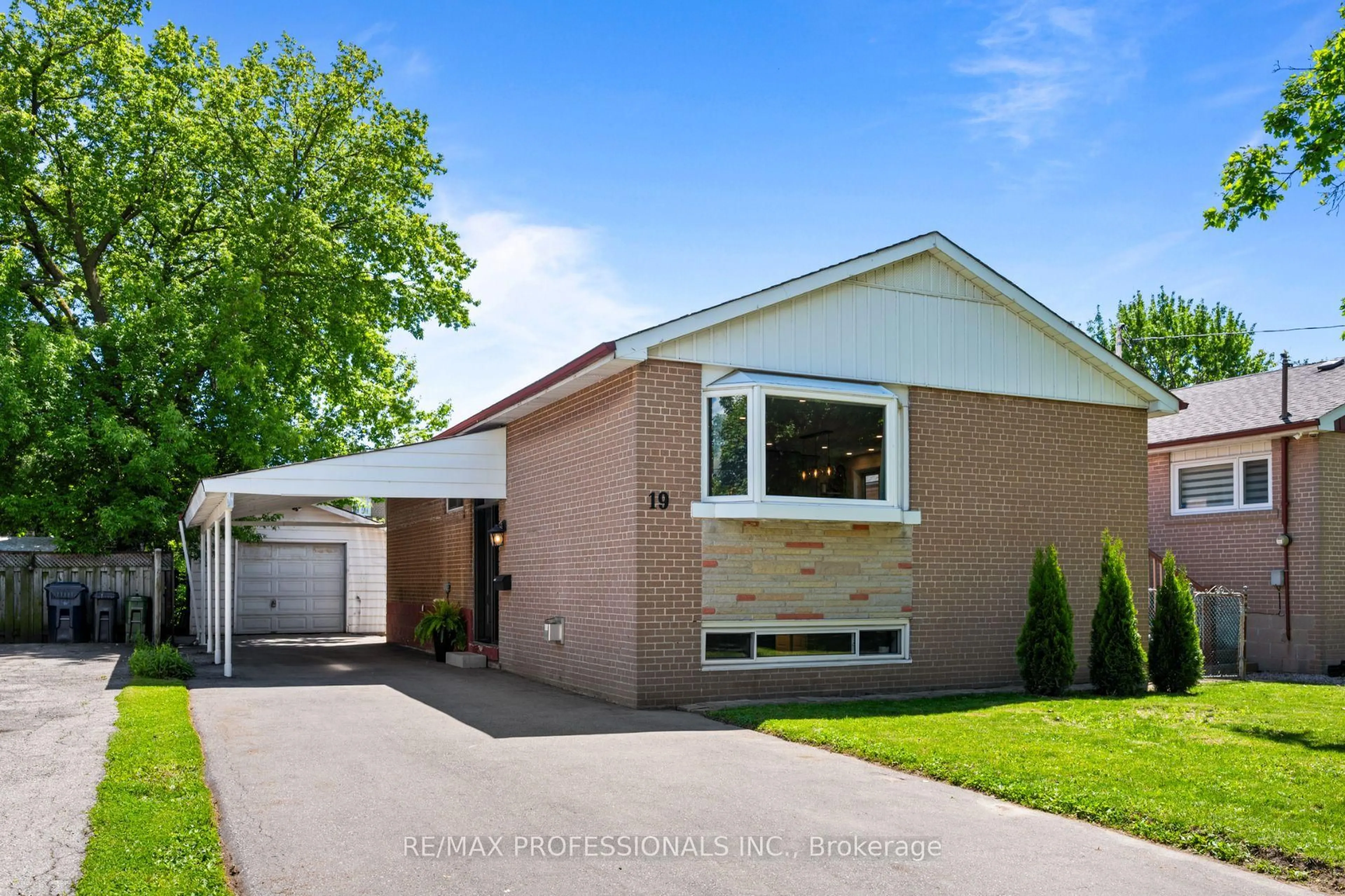 Home with brick exterior material, street for 19 Wellesworth Dr, Toronto Ontario M9C 4P5