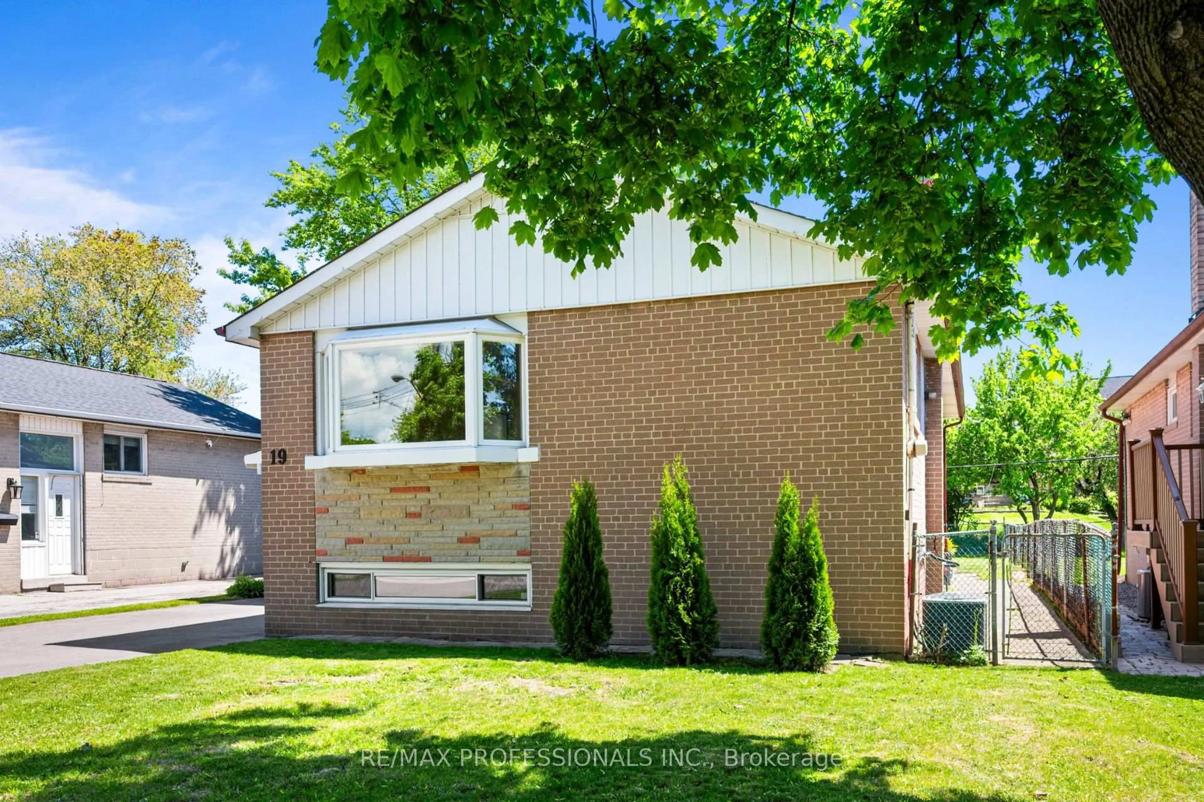 Home with brick exterior material, street for 19 Wellesworth Dr, Toronto Ontario M9C 4P5