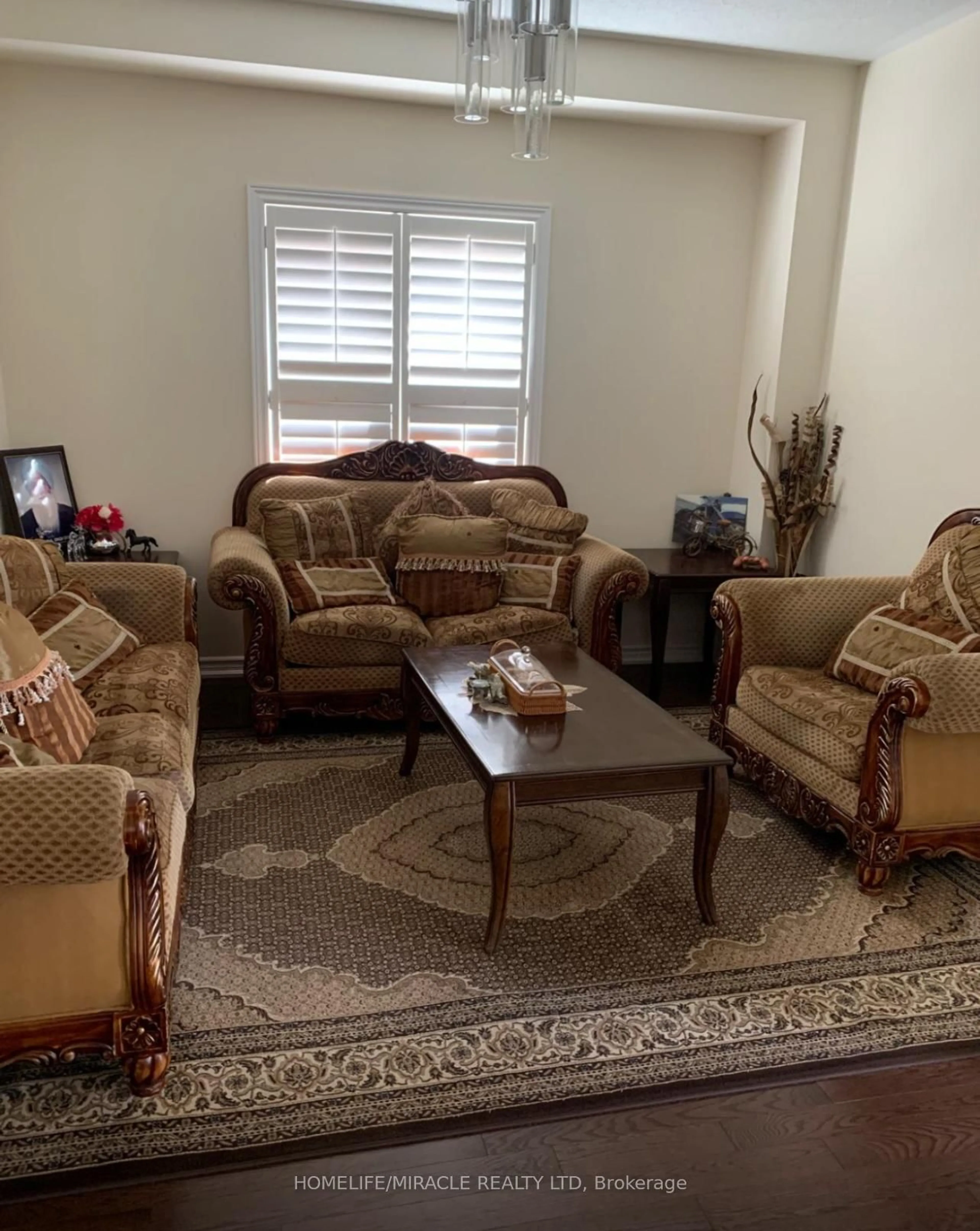 Living room with furniture, unknown for 18 Morrow Bay Dr, Brampton Ontario L6P 3T9