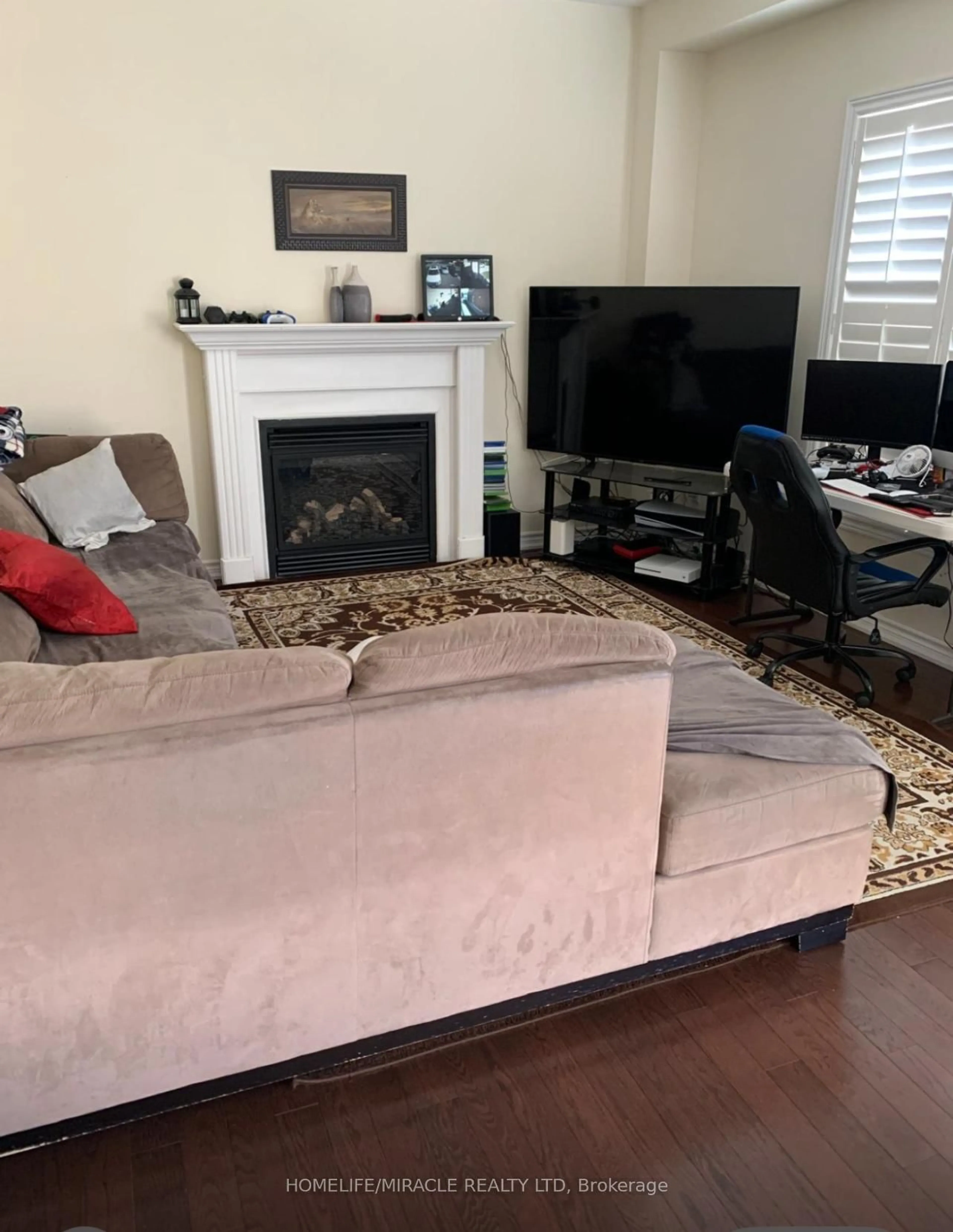 Living room with furniture, unknown for 18 Morrow Bay Dr, Brampton Ontario L6P 3T9