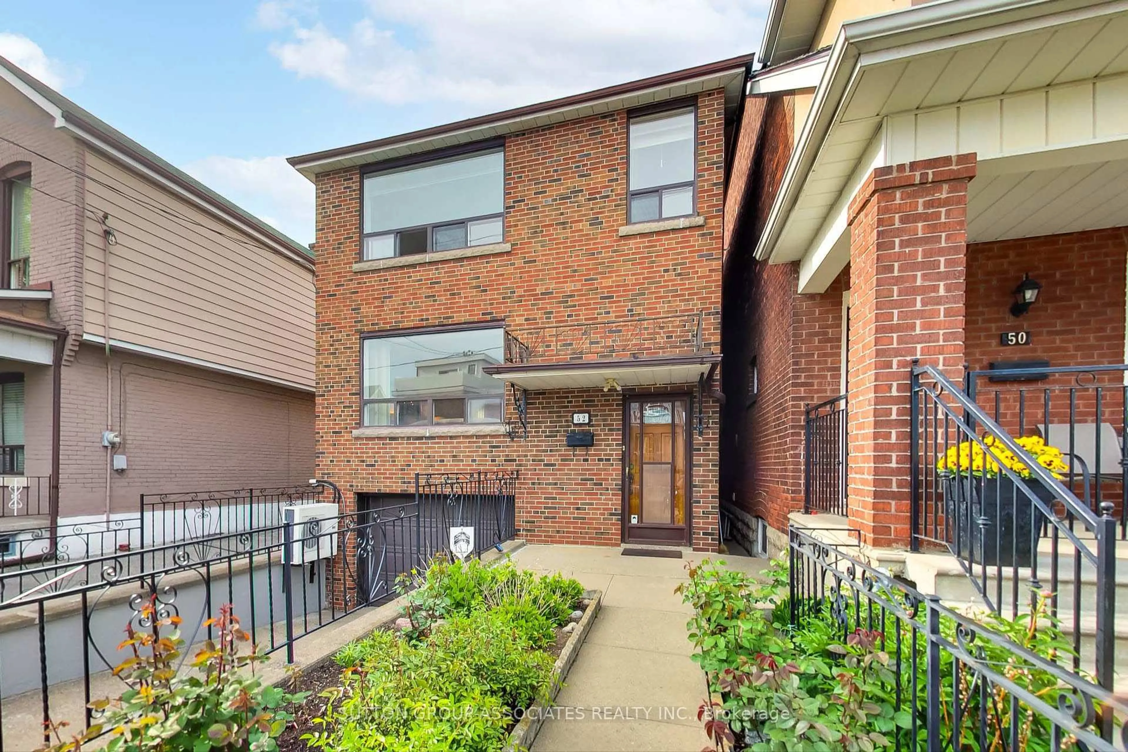 Home with brick exterior material, street for 52 Mackay Ave, Toronto Ontario M6H 2N6