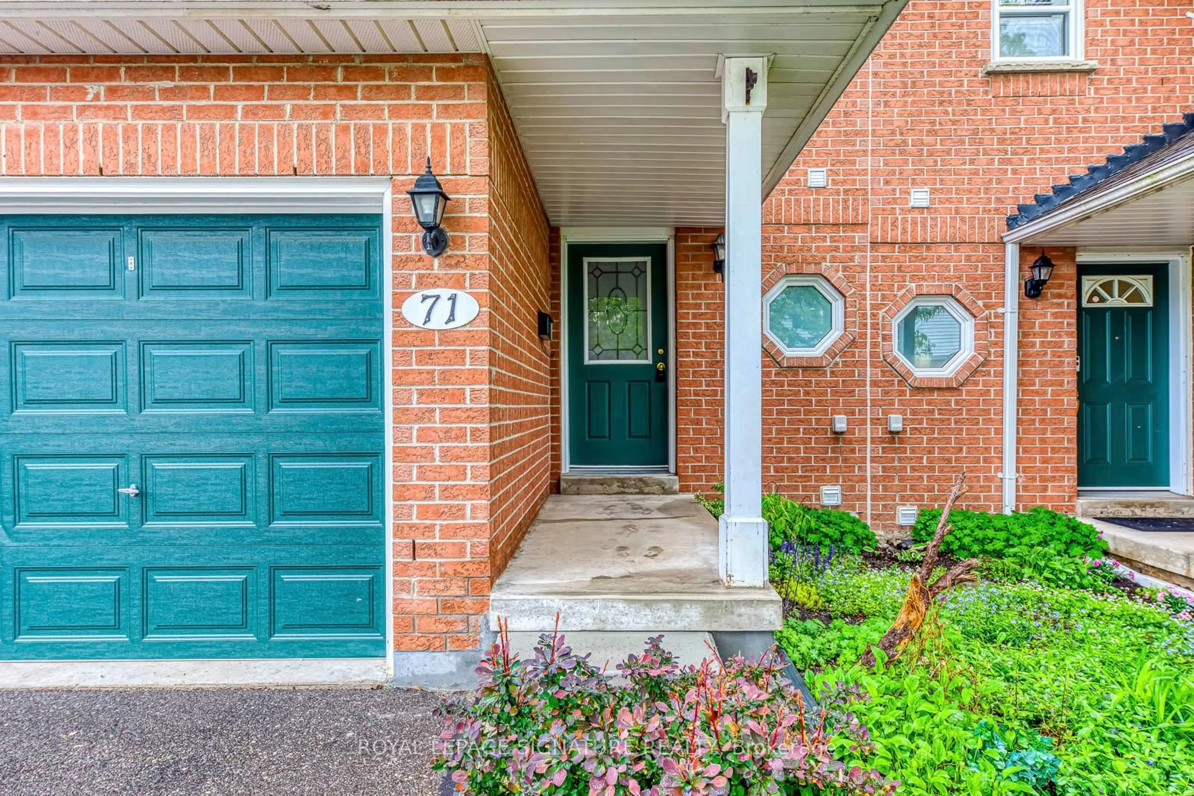 Home with brick exterior material, street for 5659 Glen Erin Dr #71, Mississauga Ontario L5M 5P2