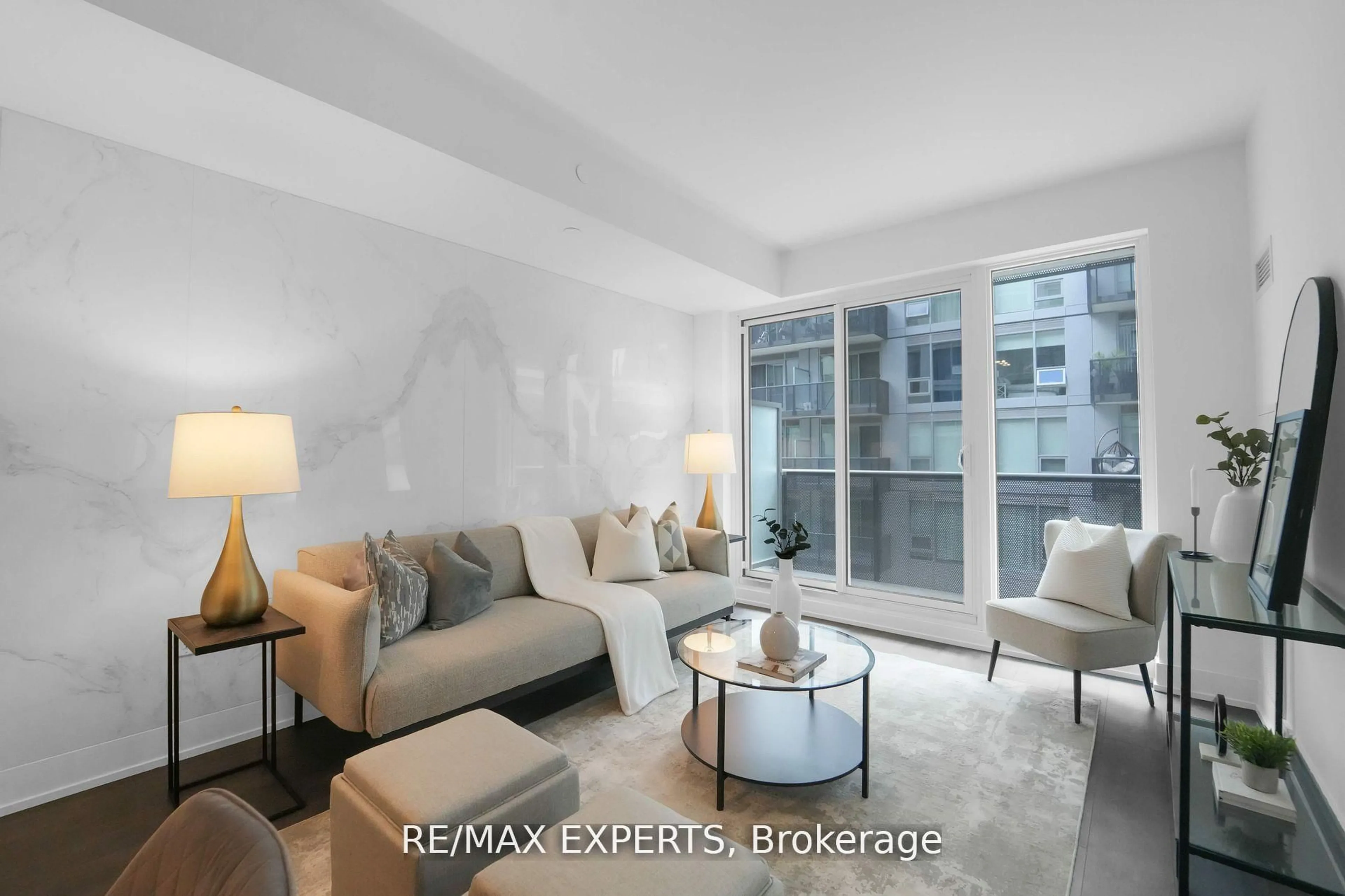 Living room with furniture, unknown for 2450 Old Bronte Rd #324, Oakville Ontario L6M 5P6