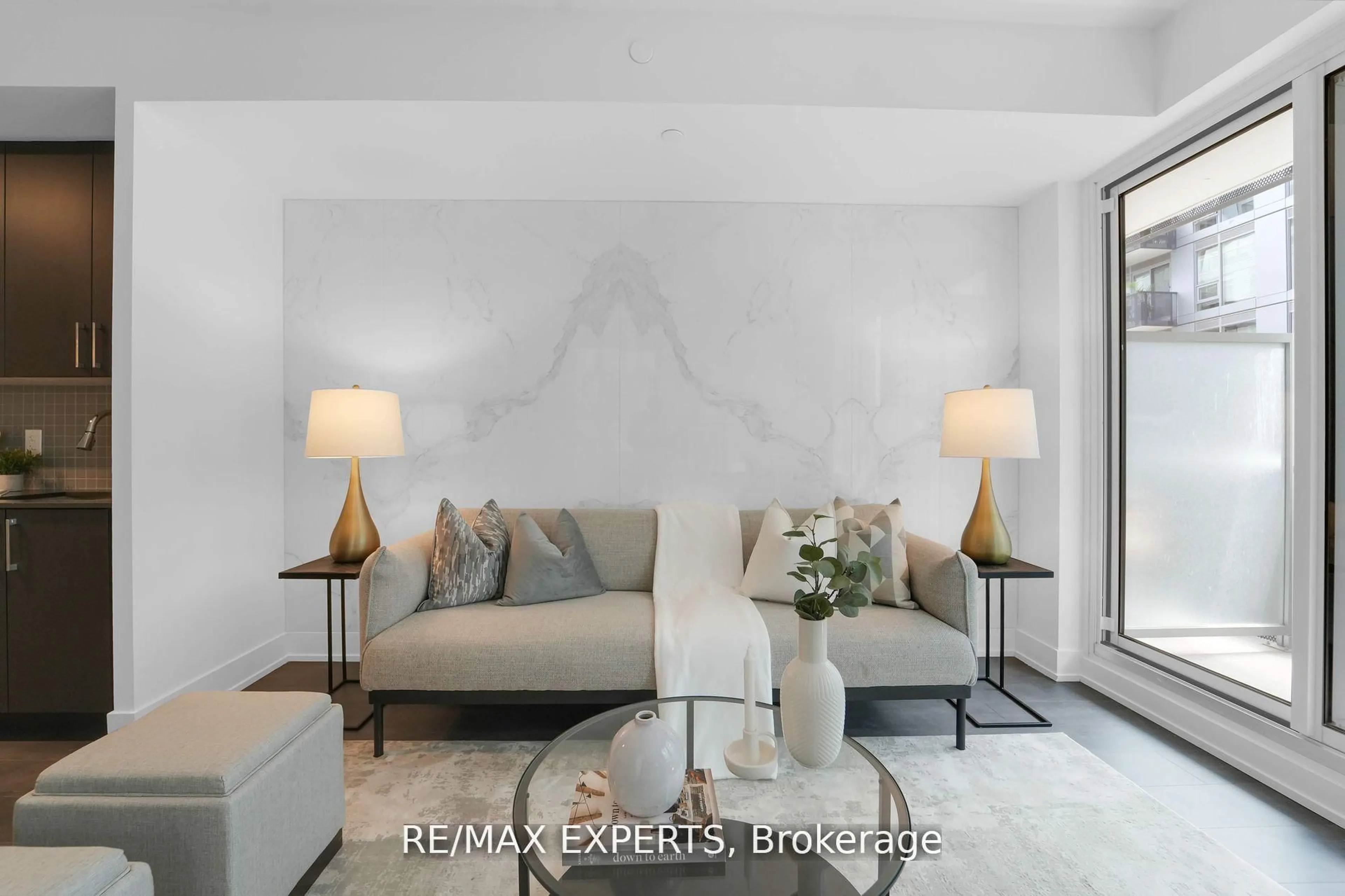 Living room with furniture, unknown for 2450 Old Bronte Rd #324, Oakville Ontario L6M 5P6