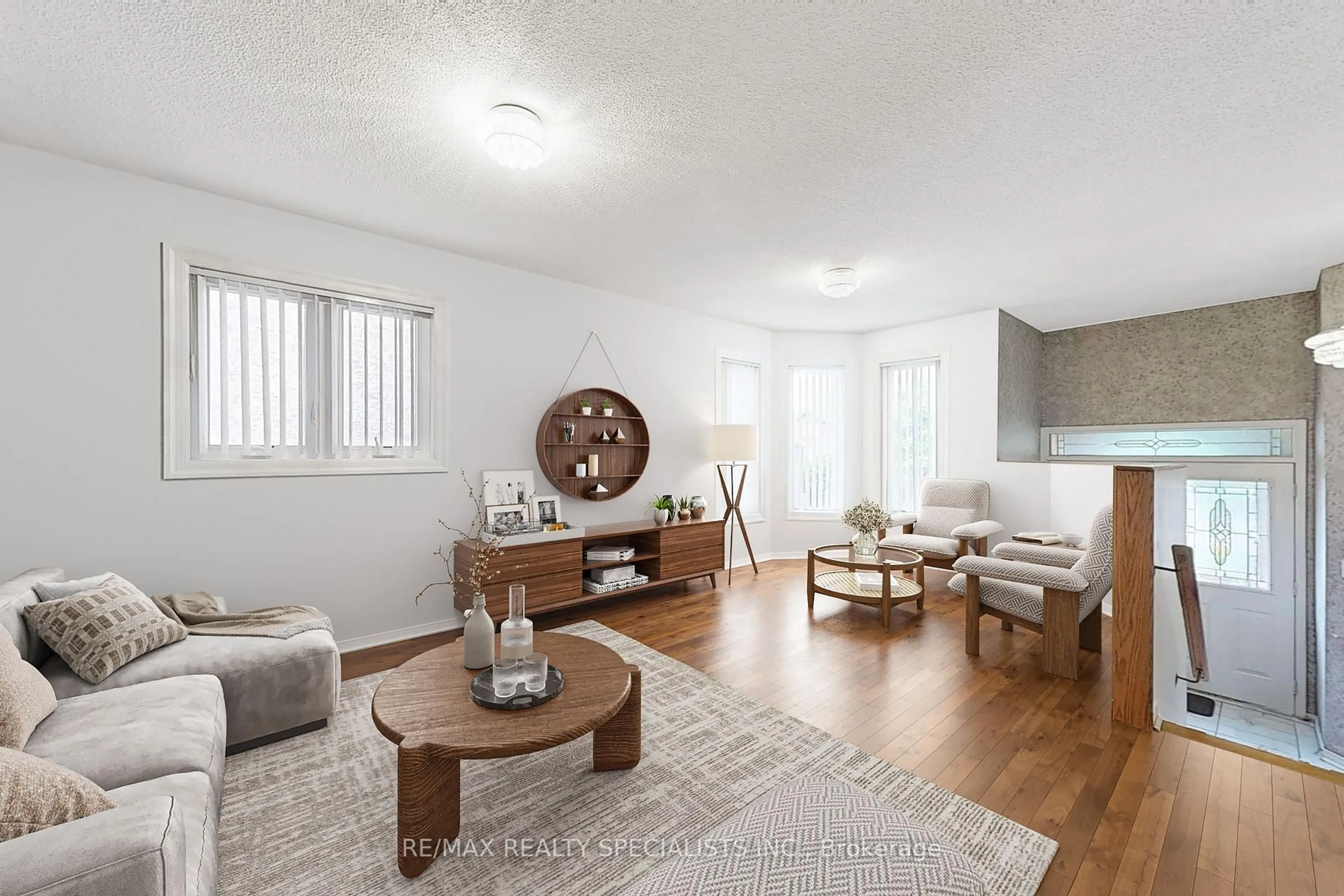 Living room with furniture, unknown for 69 Red Maple Dr, Brampton Ontario L6X 4M1