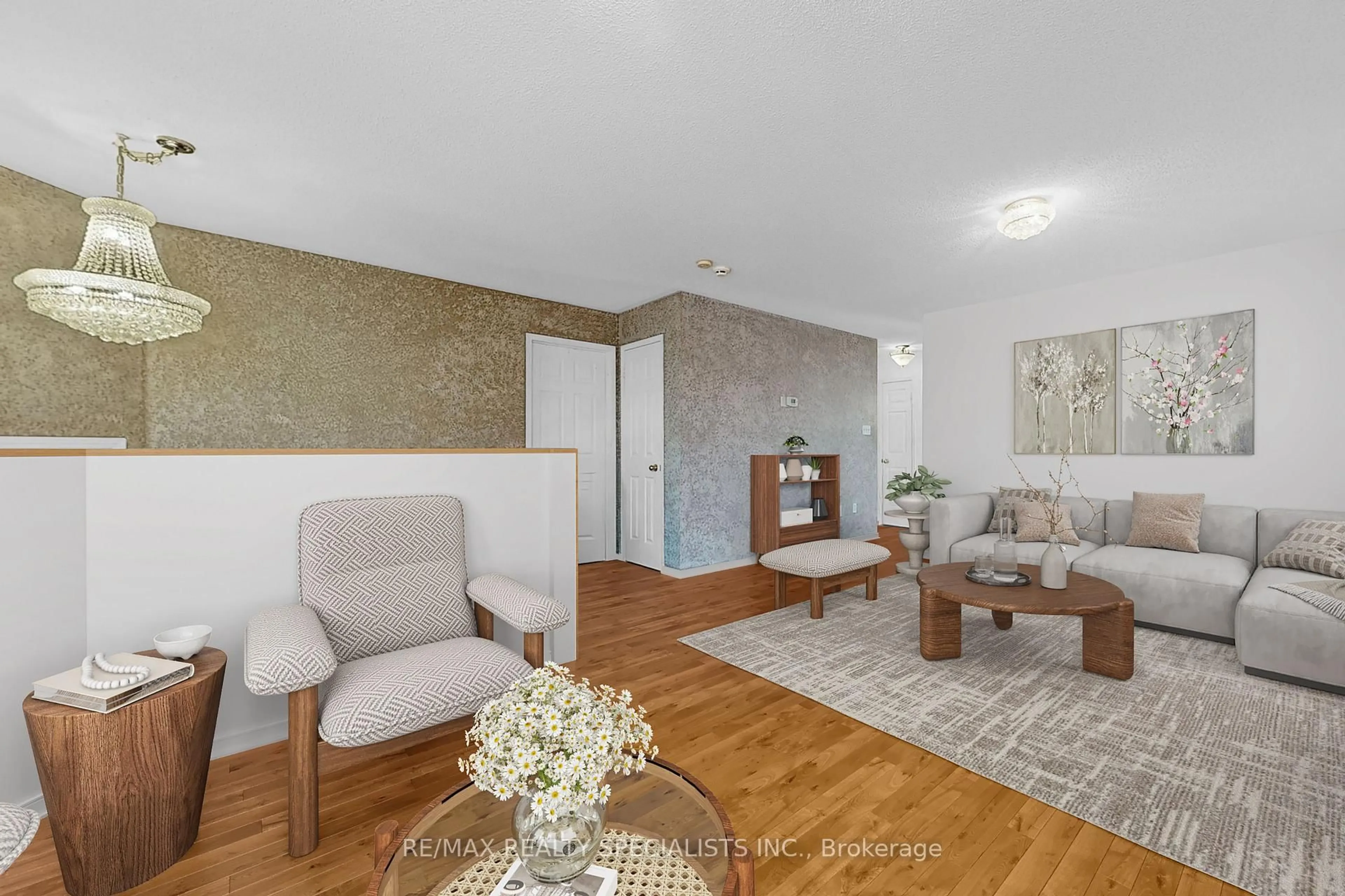 Living room with furniture, wood/laminate floor for 69 Red Maple Dr, Brampton Ontario L6X 4M1