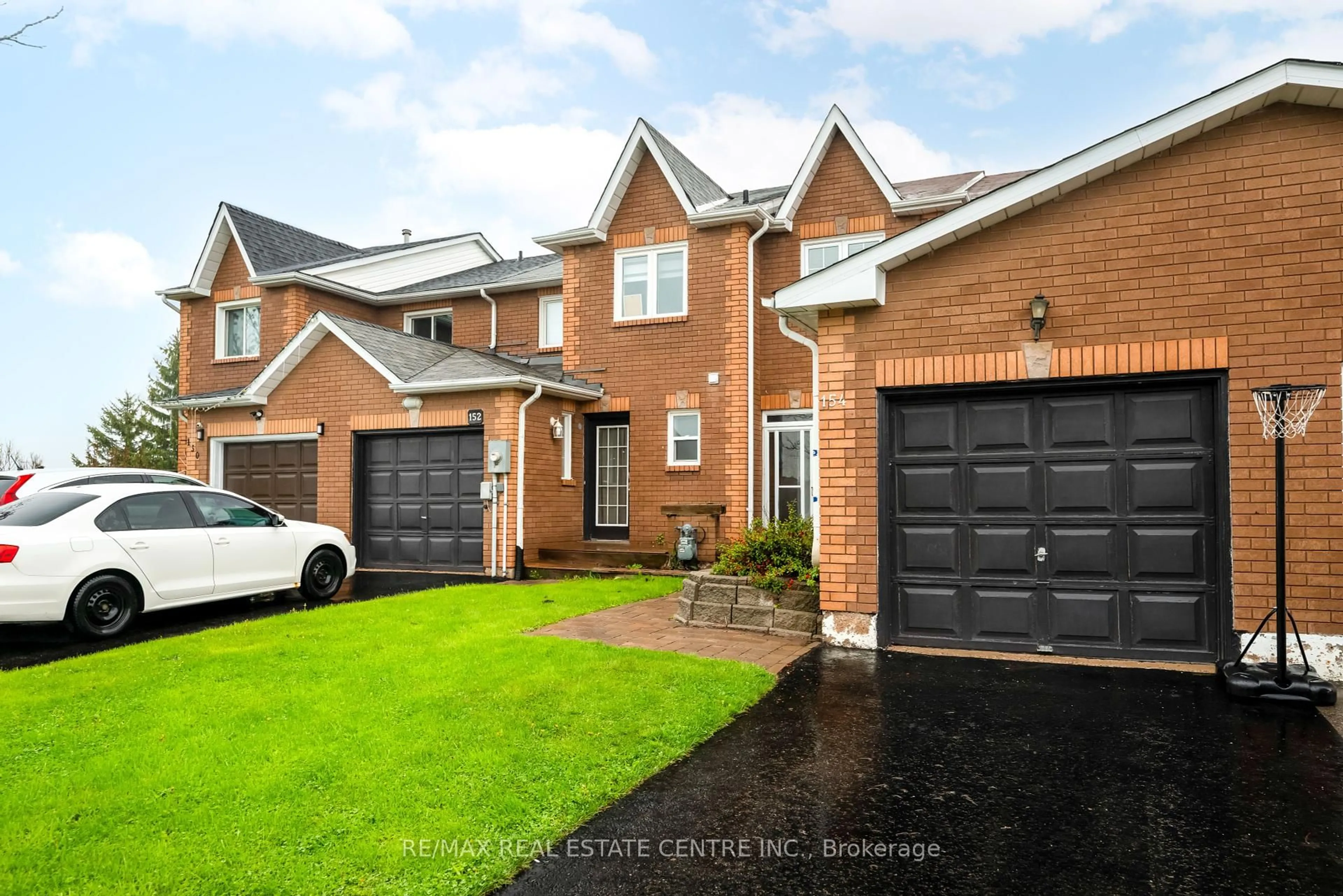 Home with brick exterior material, street for 154 Howard Cres, Orangeville Ontario L9W 4W3