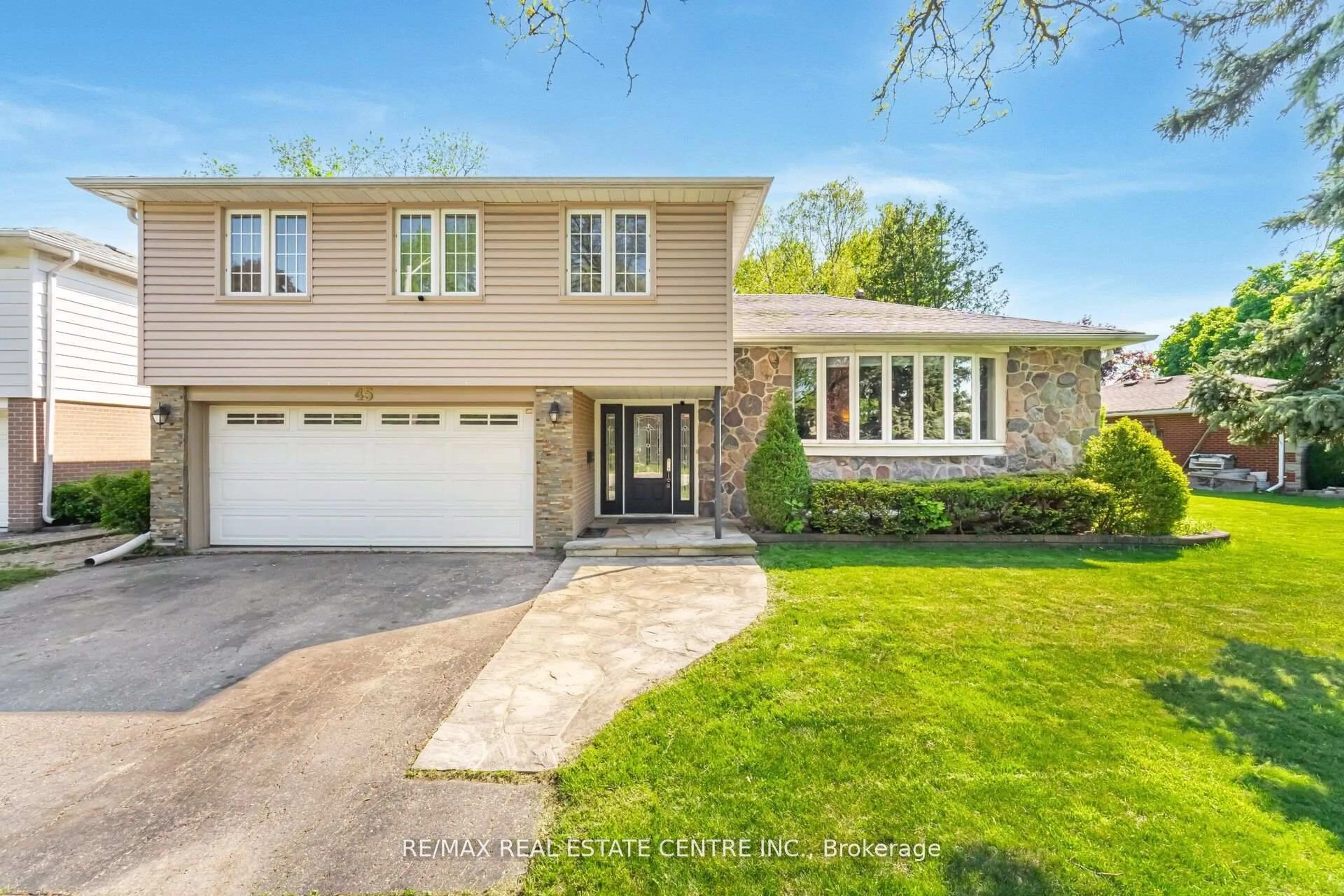 Home with brick exterior material, street for 45 Core Cres, Brampton Ontario L6W 2G6