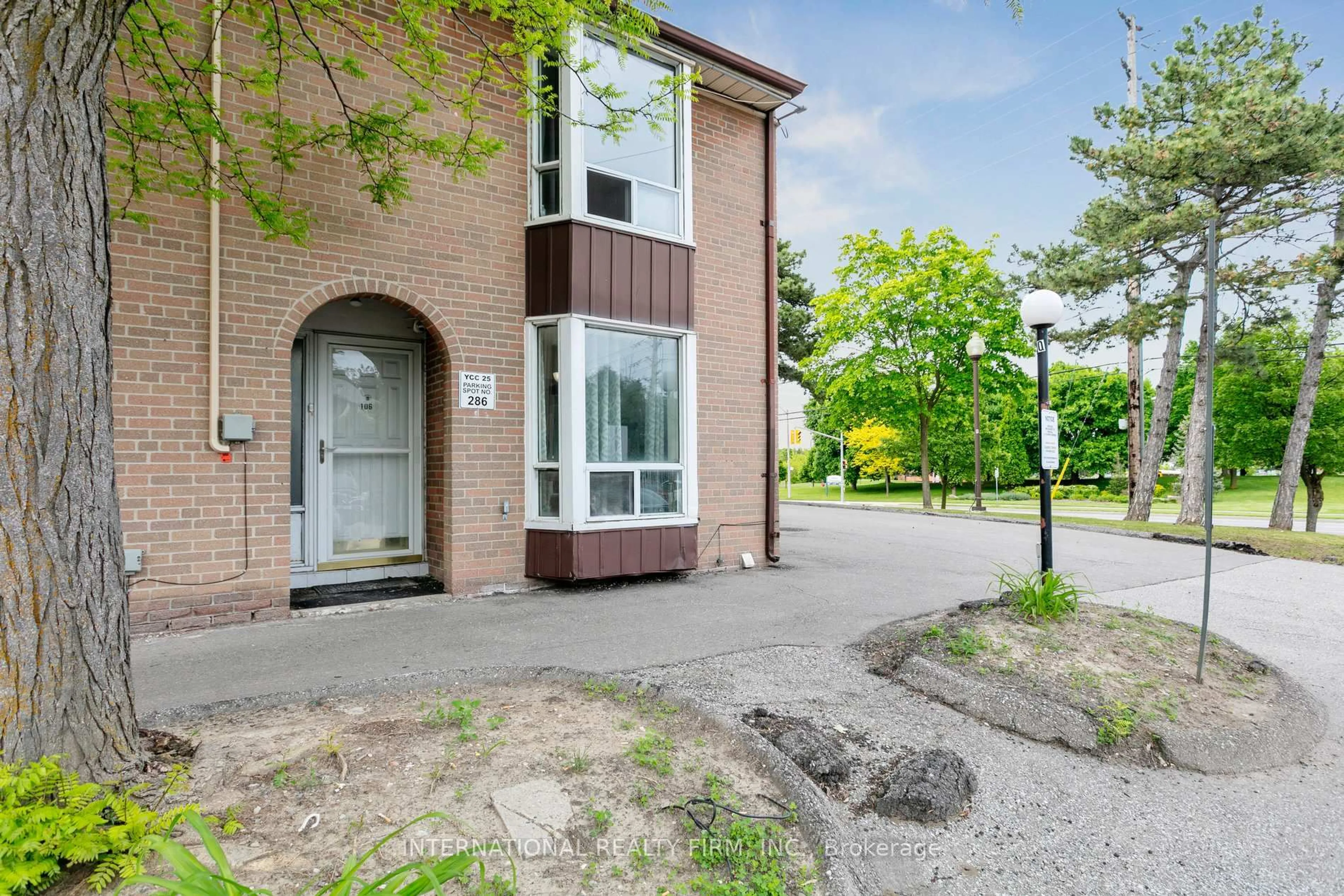 A pic from outside/outdoor area/front of a property/back of a property/a pic from drone, street for 250 John Garland Blvd #106, Toronto Ontario M9V 1N8