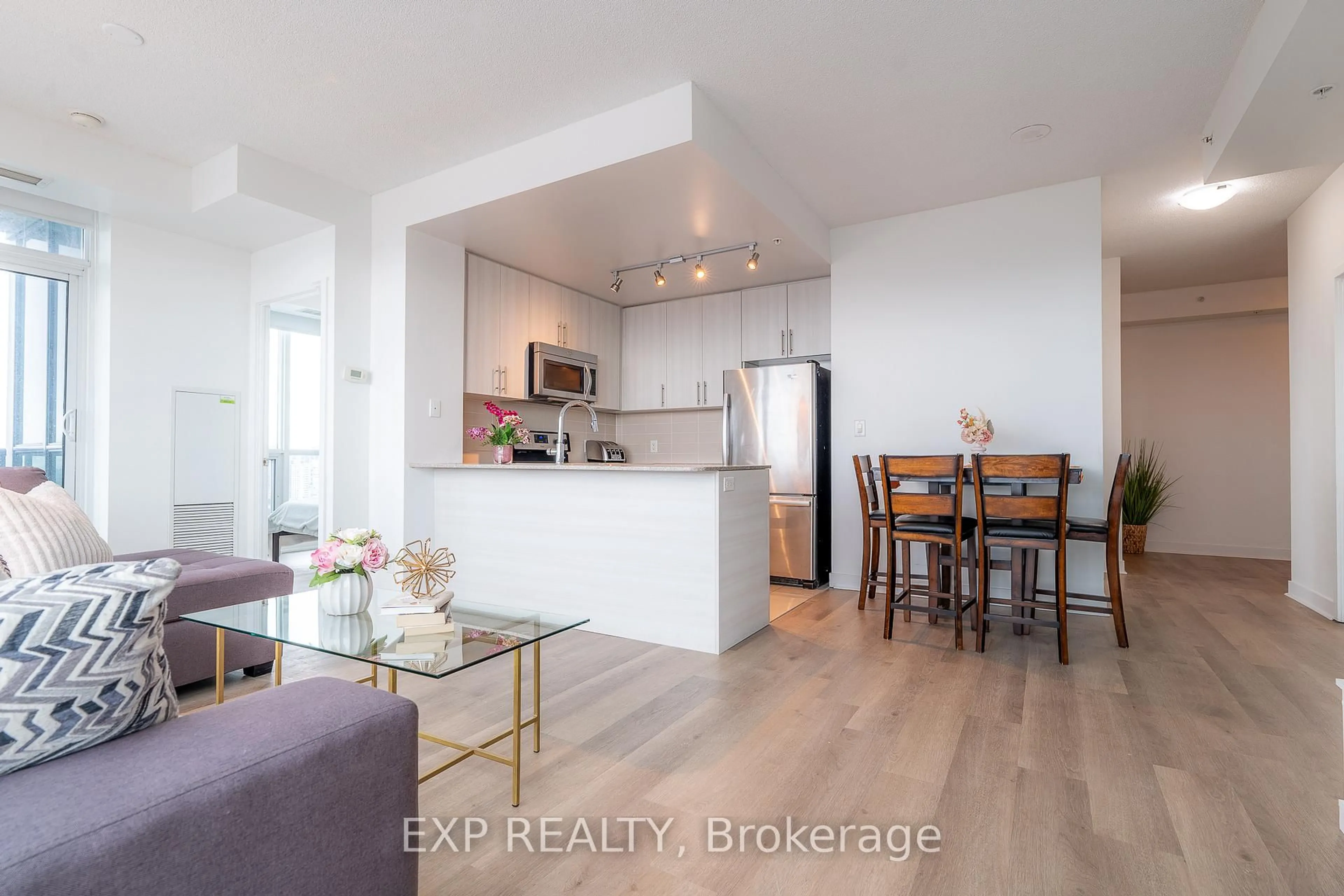 Open concept kitchen, wood/laminate floor for 3985 Grand Park Dr #2008, Mississauga Ontario L5B 0H8