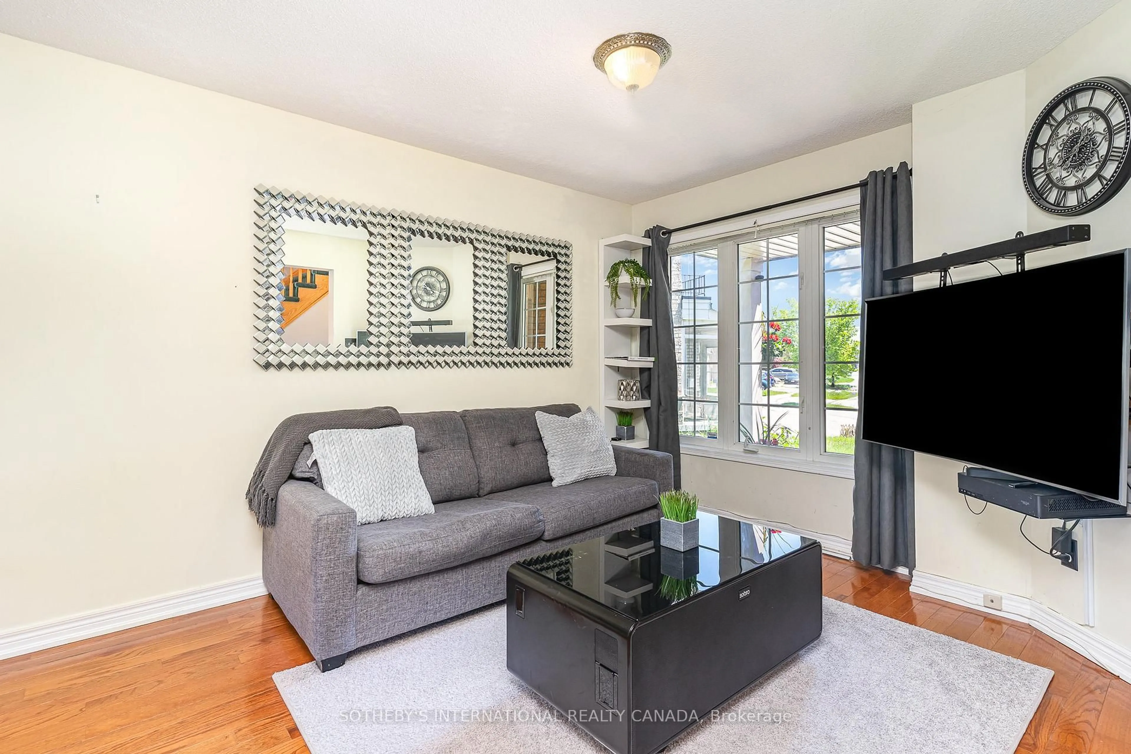 Living room with furniture, unknown for 7640 Black Walnut Tr, Mississauga Ontario L5N 8A7