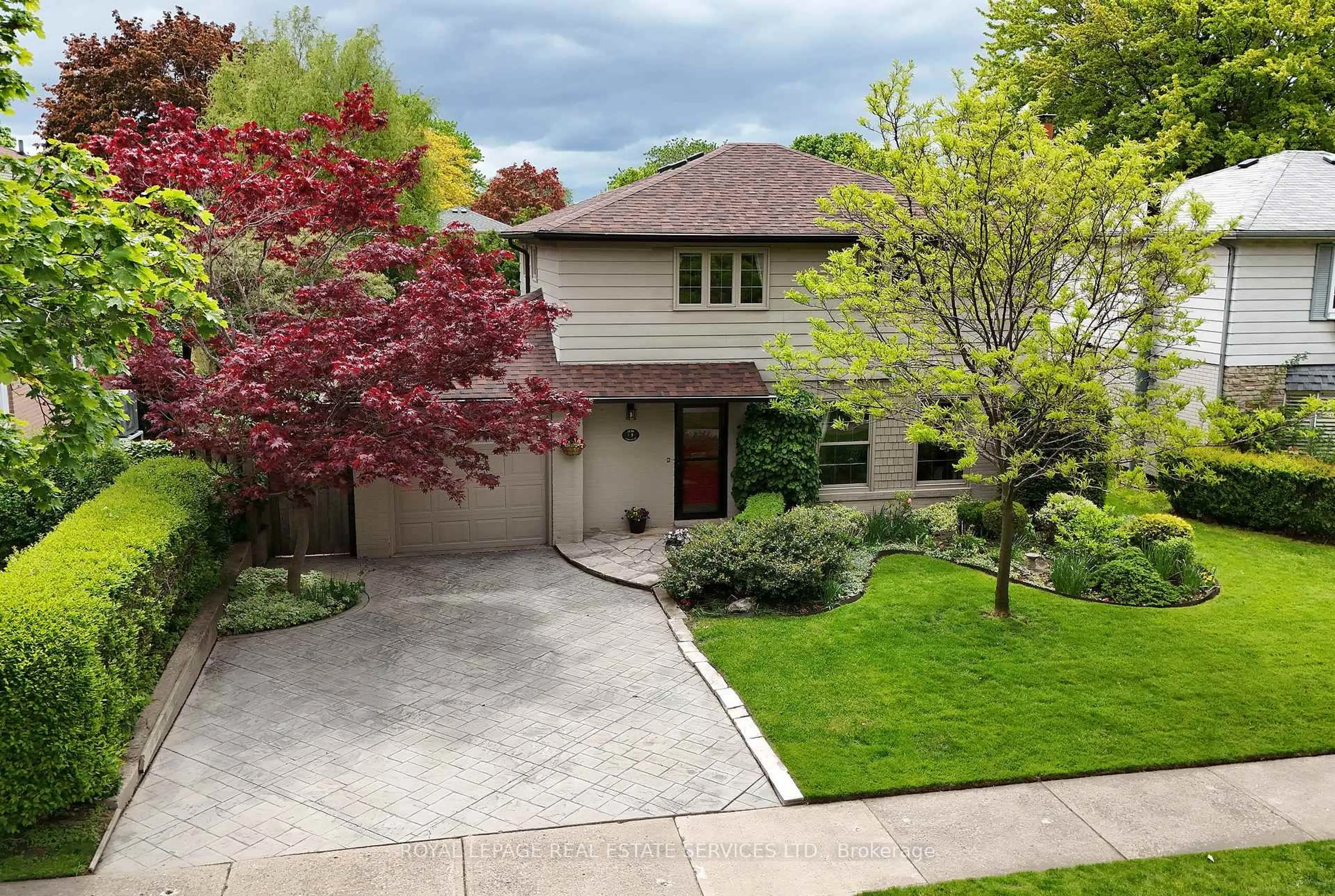 Home with brick exterior material, street for 1439 Glen Rutley Circ, Mississauga Ontario L4X 1Z8