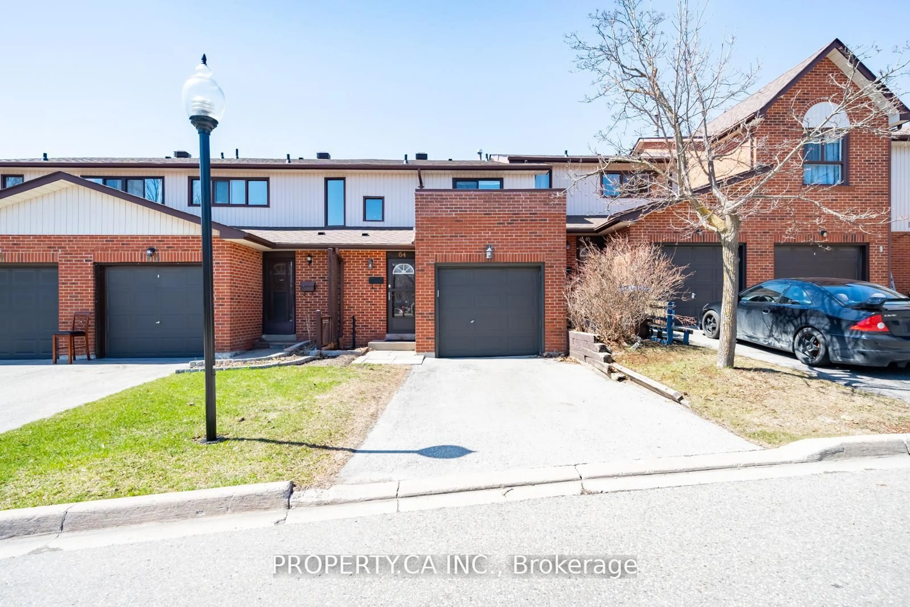 Home with brick exterior material, street for 64 Dawson Cres, Brampton Ontario L6V 3M6
