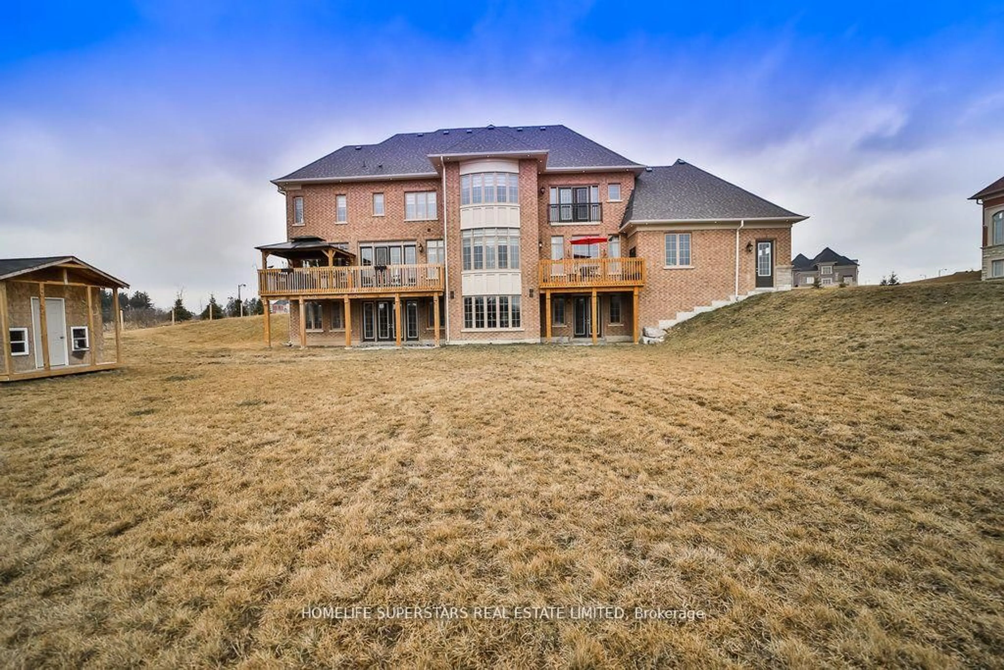 A pic from outside/outdoor area/front of a property/back of a property/a pic from drone, building for 134 AMOS DRIVE Amos Dr, Caledon Ontario L7E 4L7
