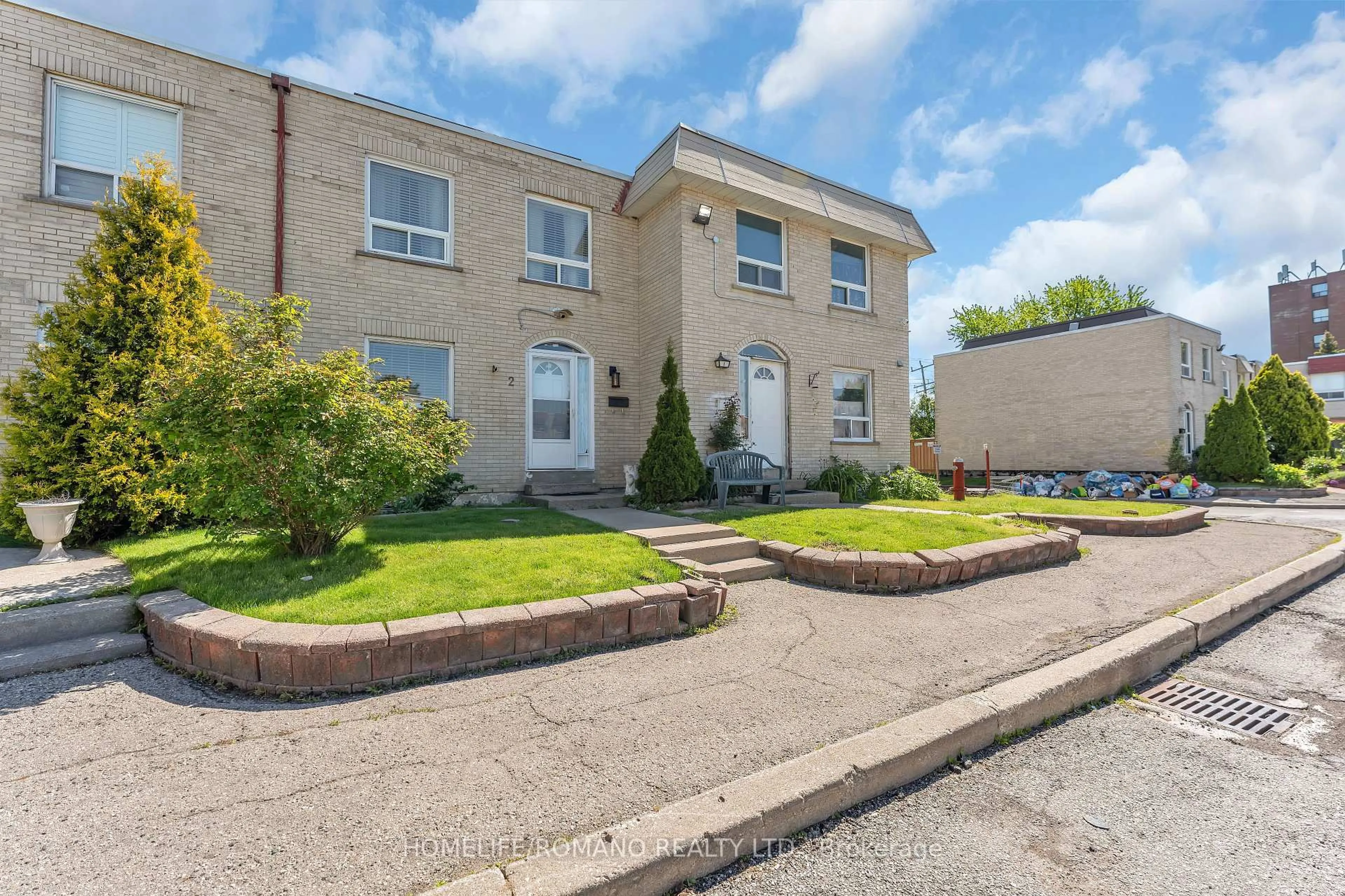 A pic from outside/outdoor area/front of a property/back of a property/a pic from drone, street for 7440 Goreway Dr #2, Mississauga Ontario L4T 2V2