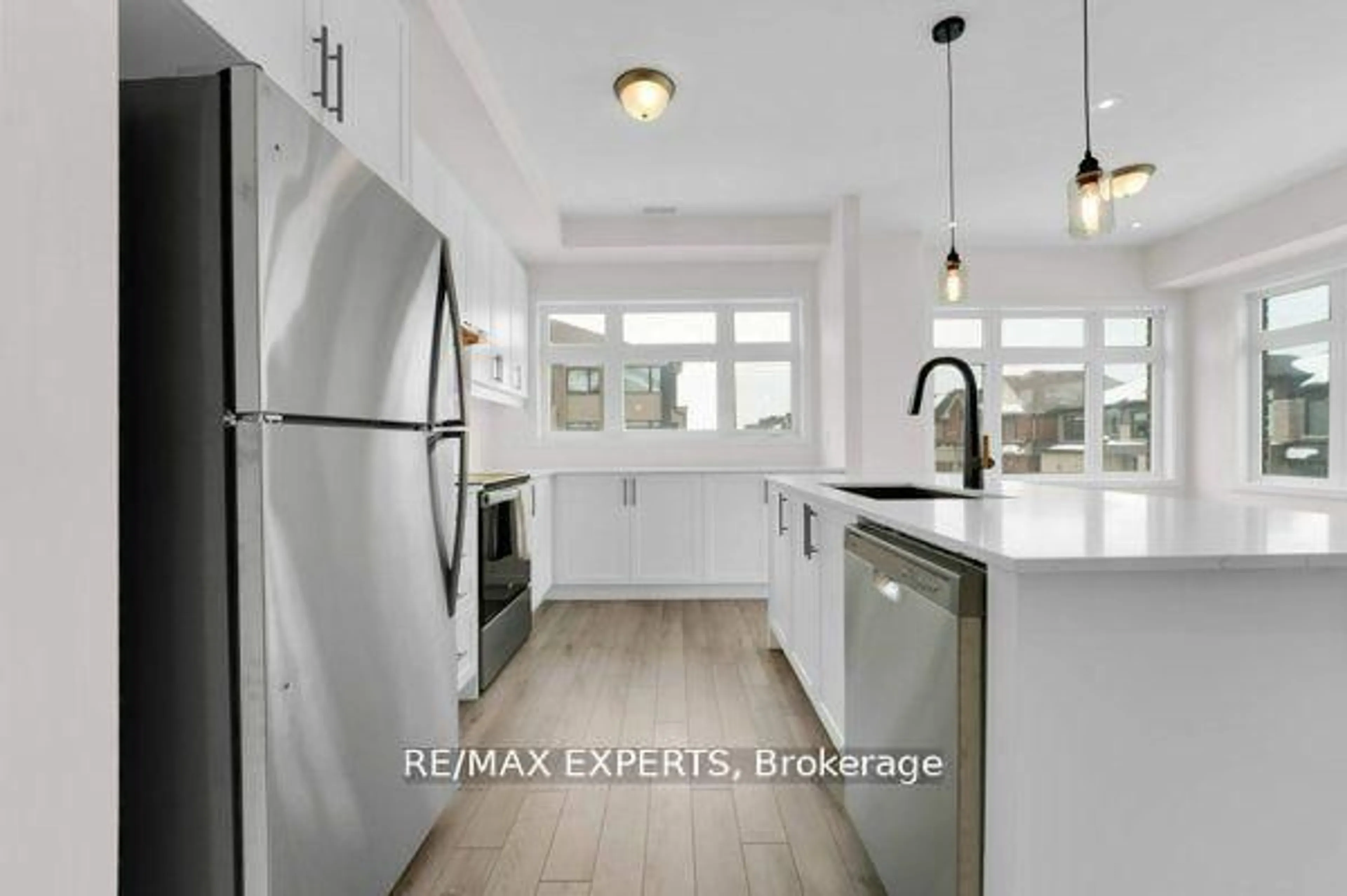Open concept kitchen, ceramic/tile floor for 1537 Moonseed Pl, Milton Ontario L9T 7E7