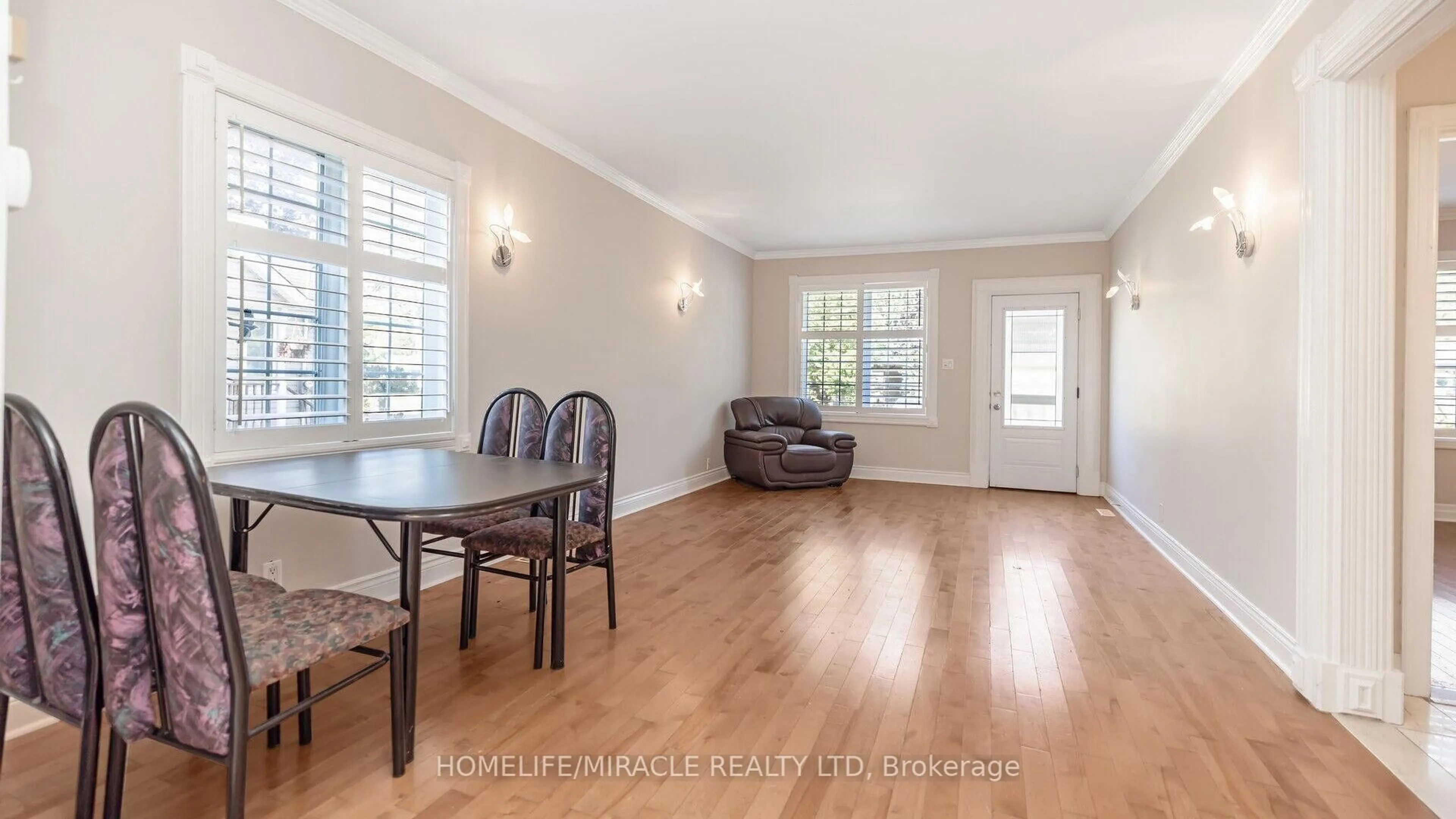 Living room with furniture, wood/laminate floor for 112 Troy St, Mississauga Ontario L5G 1S7