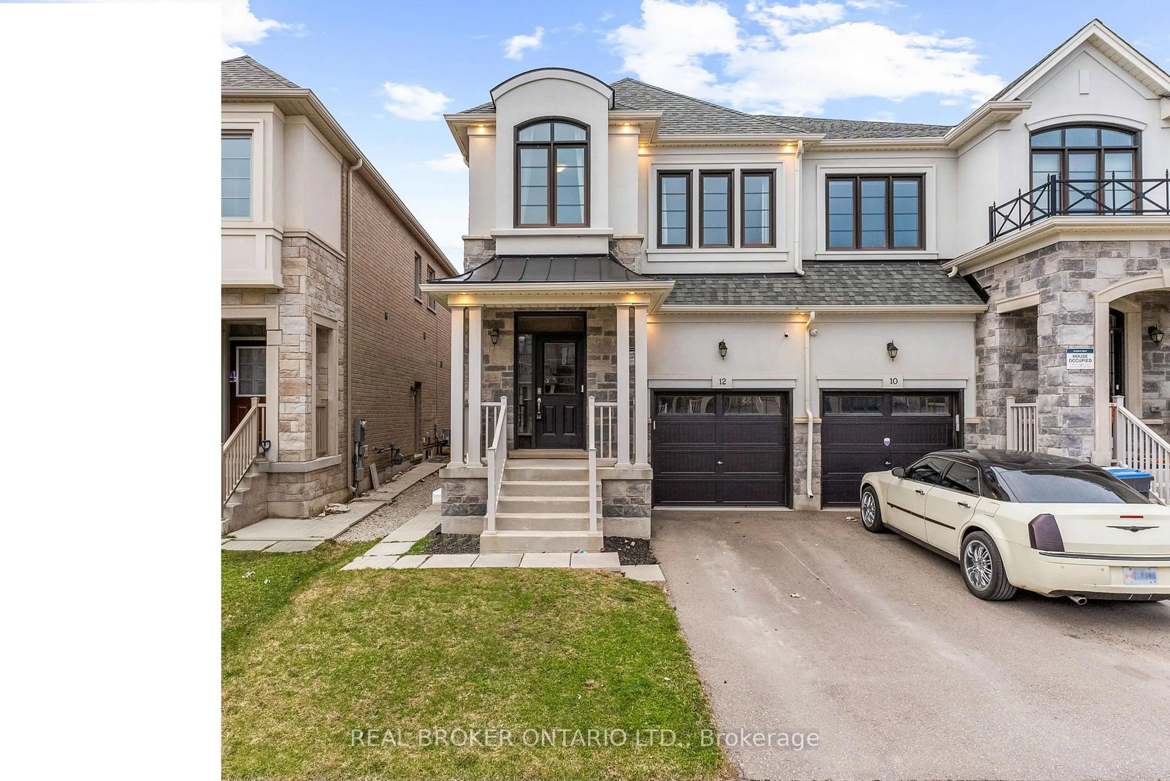 Home with brick exterior material, street for 12 Hubbell Rd, Brampton Ontario L6Y 2A5