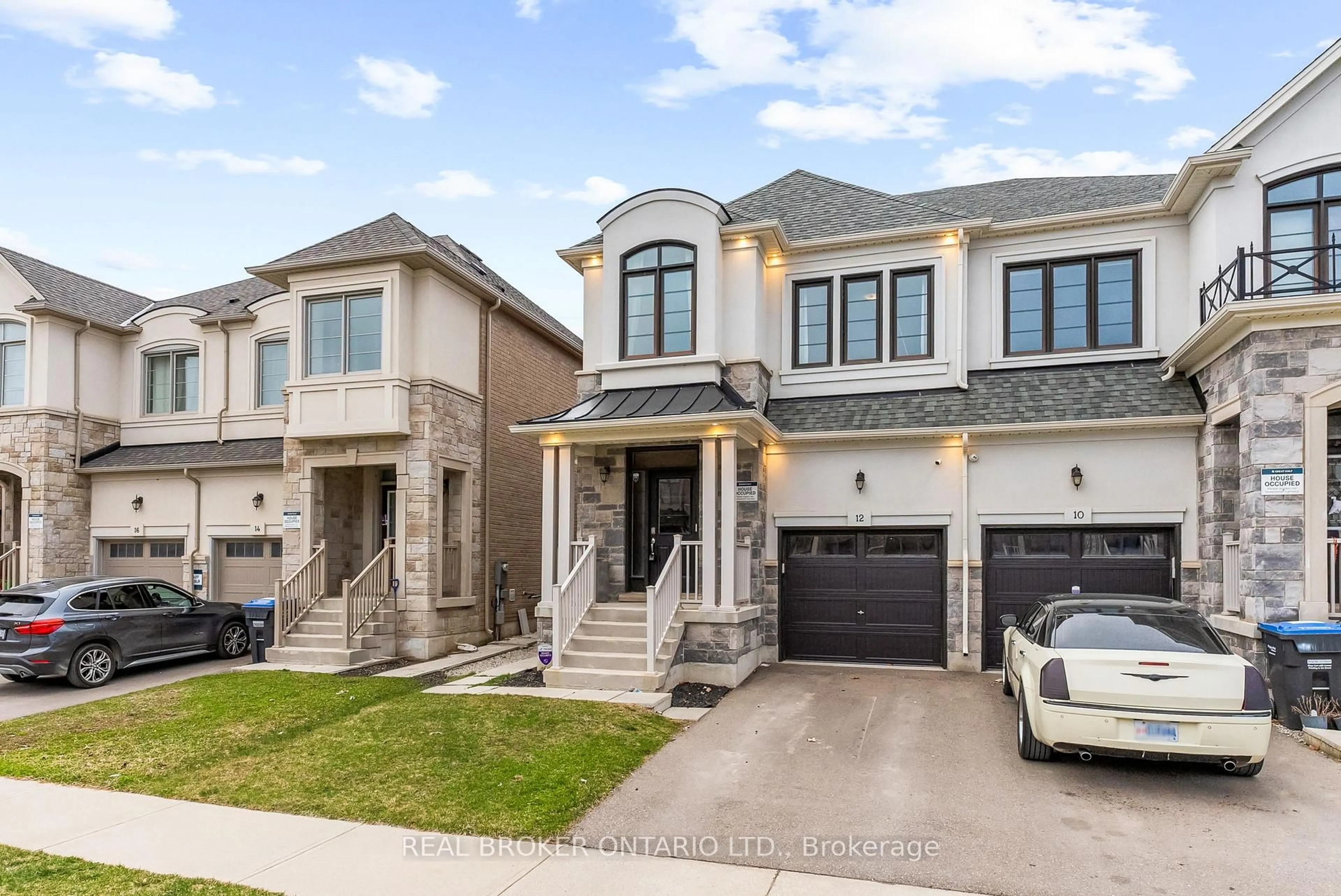 Home with brick exterior material, street for 12 Hubbell Rd, Brampton Ontario L6Y 2A5