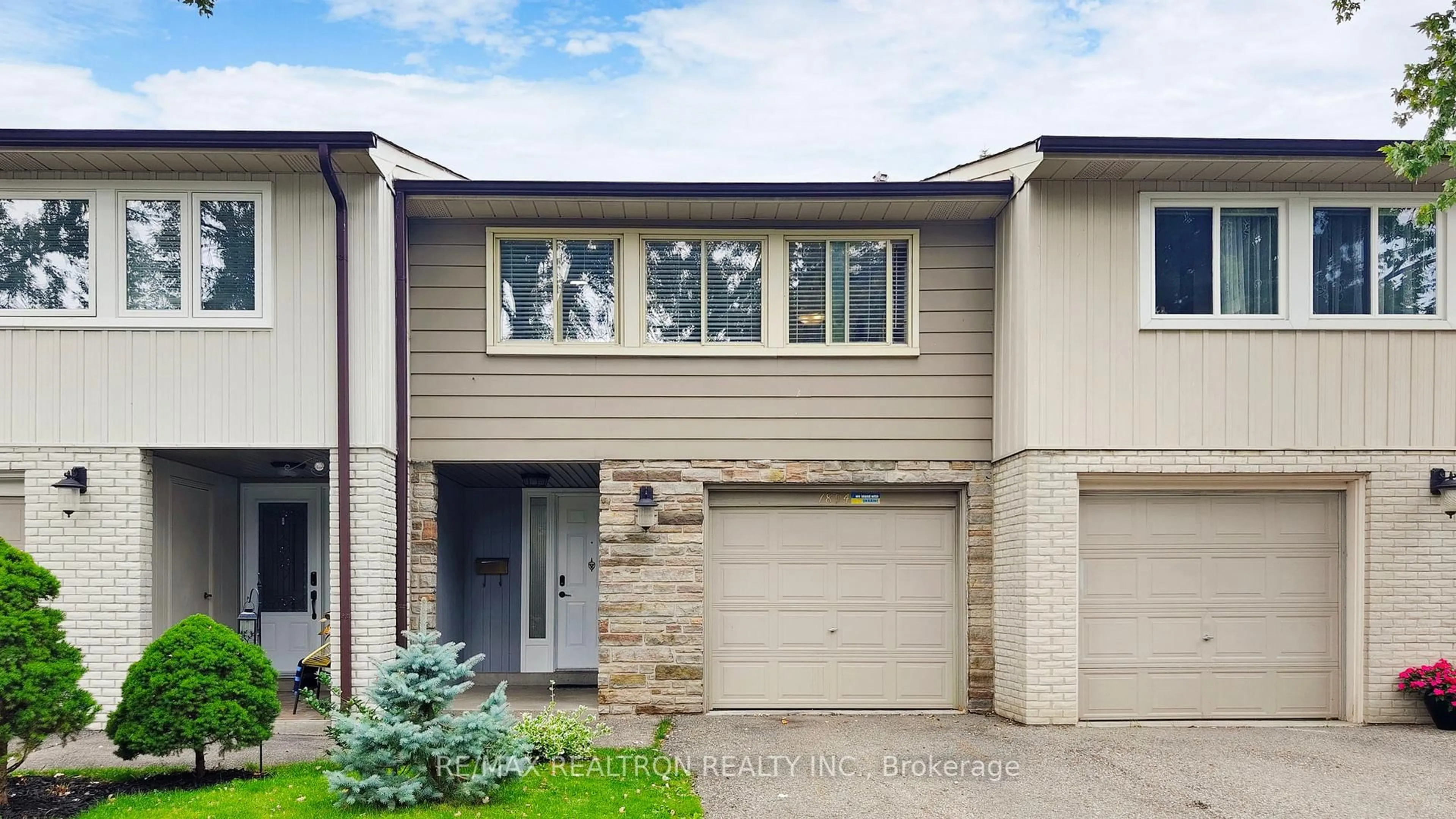 Home with vinyl exterior material, street for 1894 Kirkwall Cres #20, Mississauga Ontario L4X 1P1