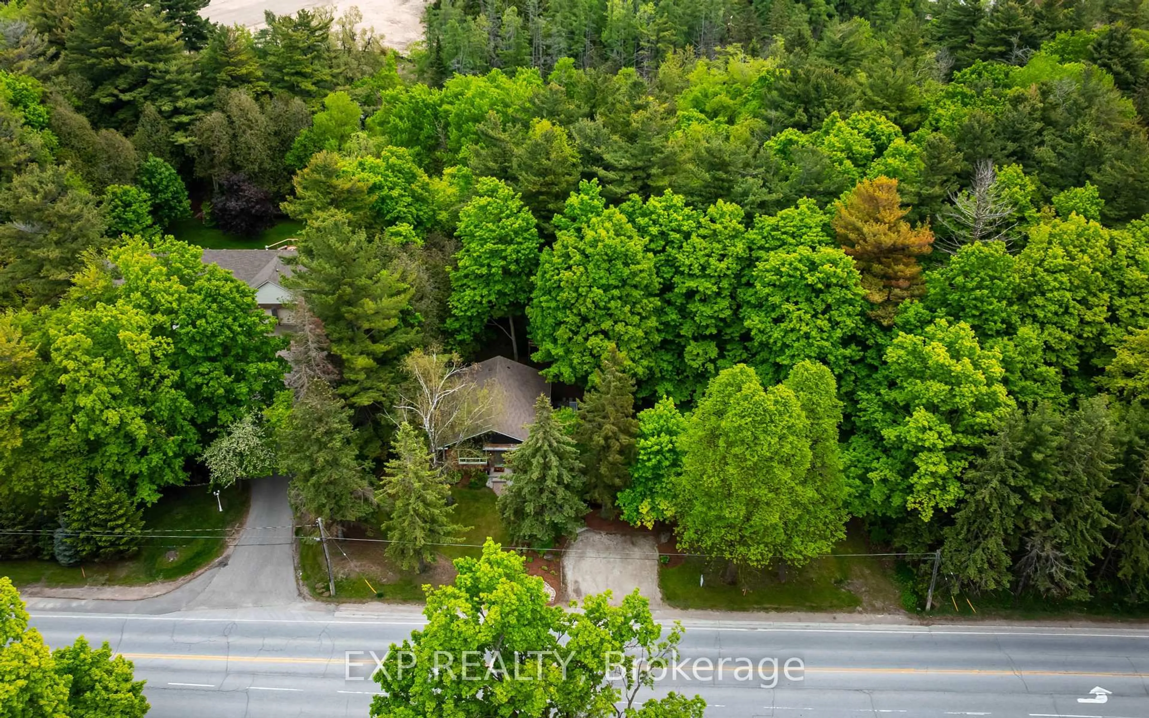 A pic from outside/outdoor area/front of a property/back of a property/a pic from drone, forest/trees view for 21 Veteran's Way N/A, Orangeville Ontario L9W 2Z1