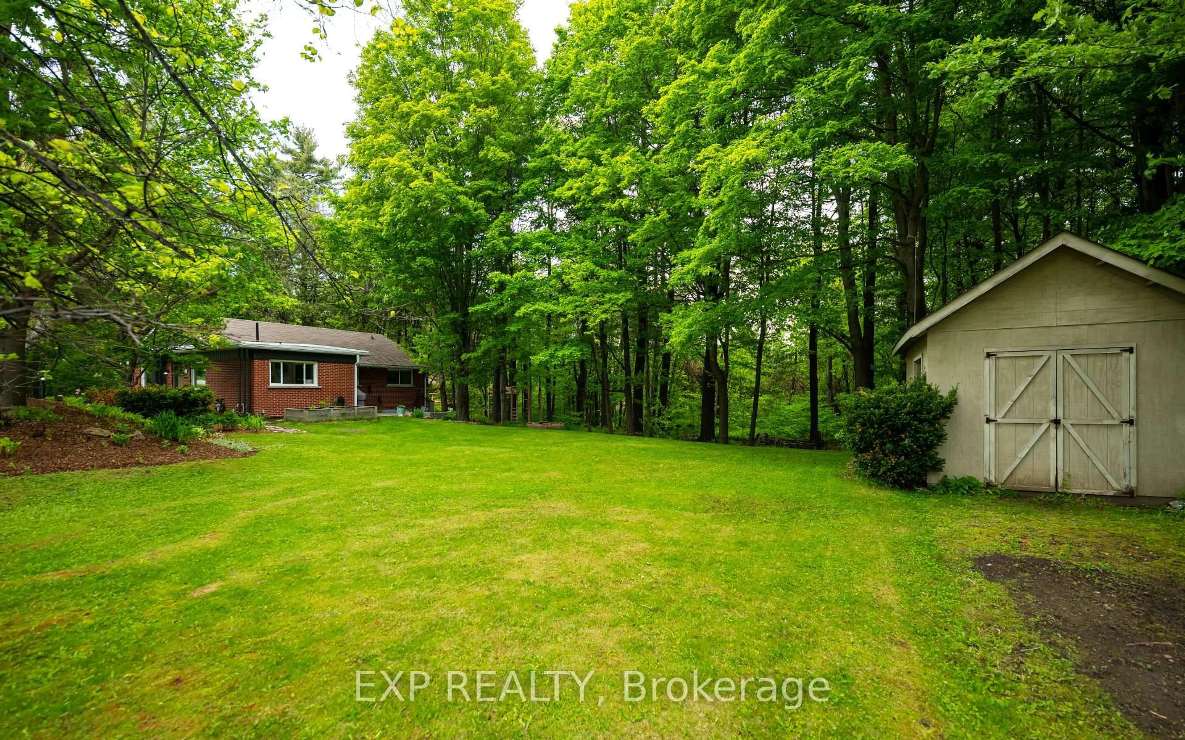 A pic from outside/outdoor area/front of a property/back of a property/a pic from drone, forest/trees view for 21 Veteran's Way N/A, Orangeville Ontario L9W 2Z1