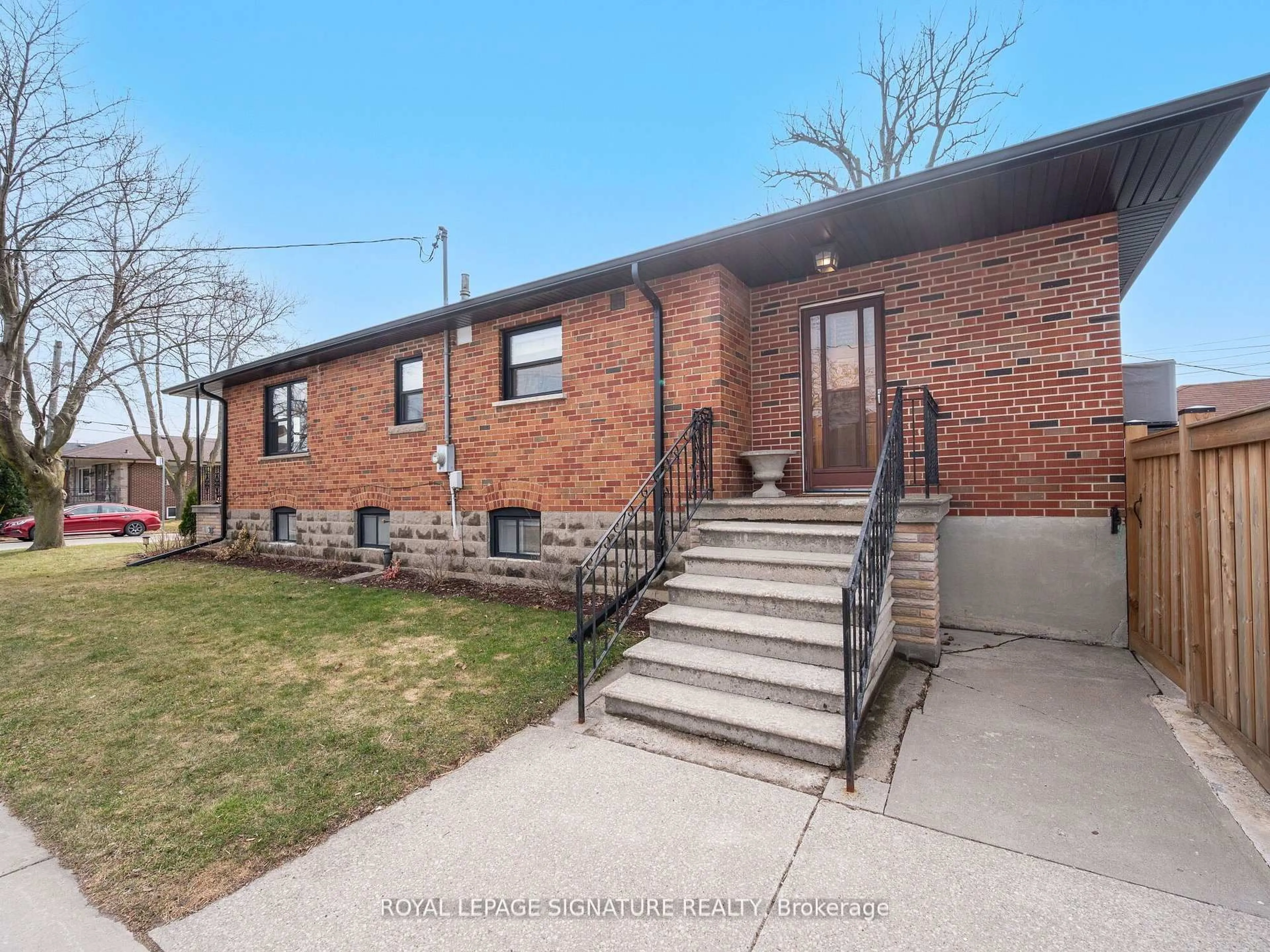 Home with brick exterior material, street for 136 Schell Ave, Toronto Ontario M6E 2T1