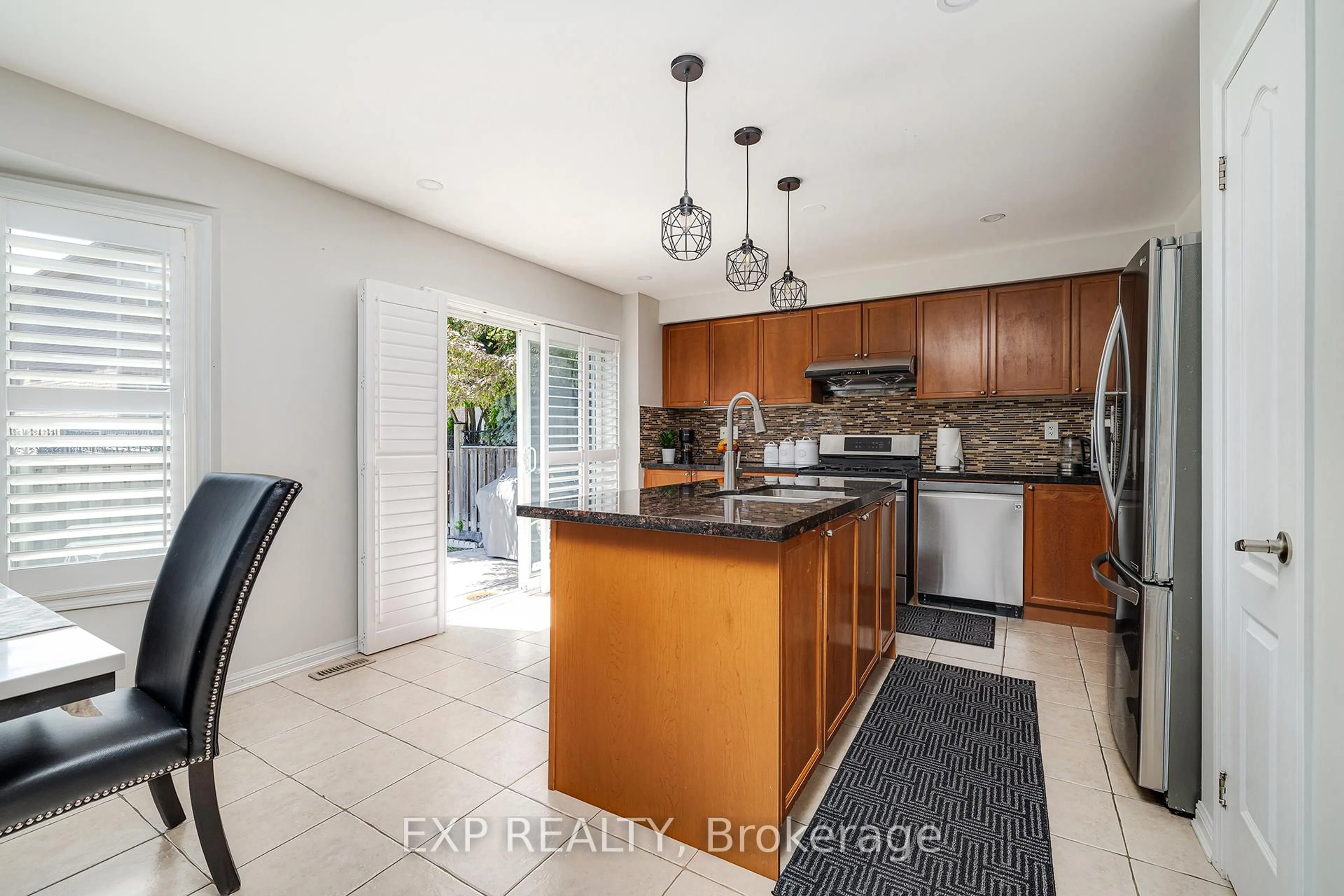 Open concept kitchen, ceramic/tile floor for 951 Cousens Terr, Milton Ontario L9T 0E1