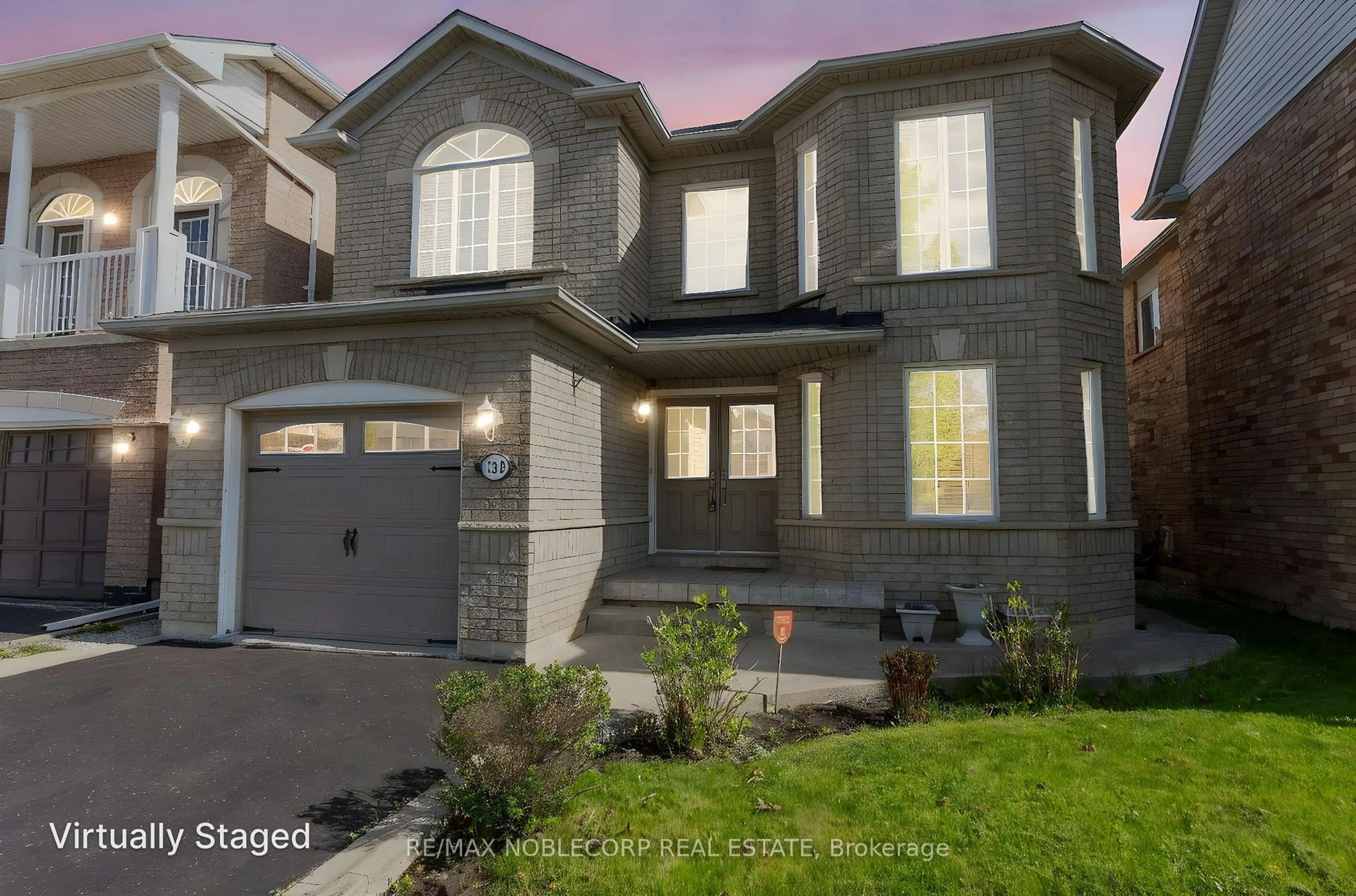 Home with brick exterior material, street for 129 Queen Mary Dr, Brampton Ontario L7A 2R5