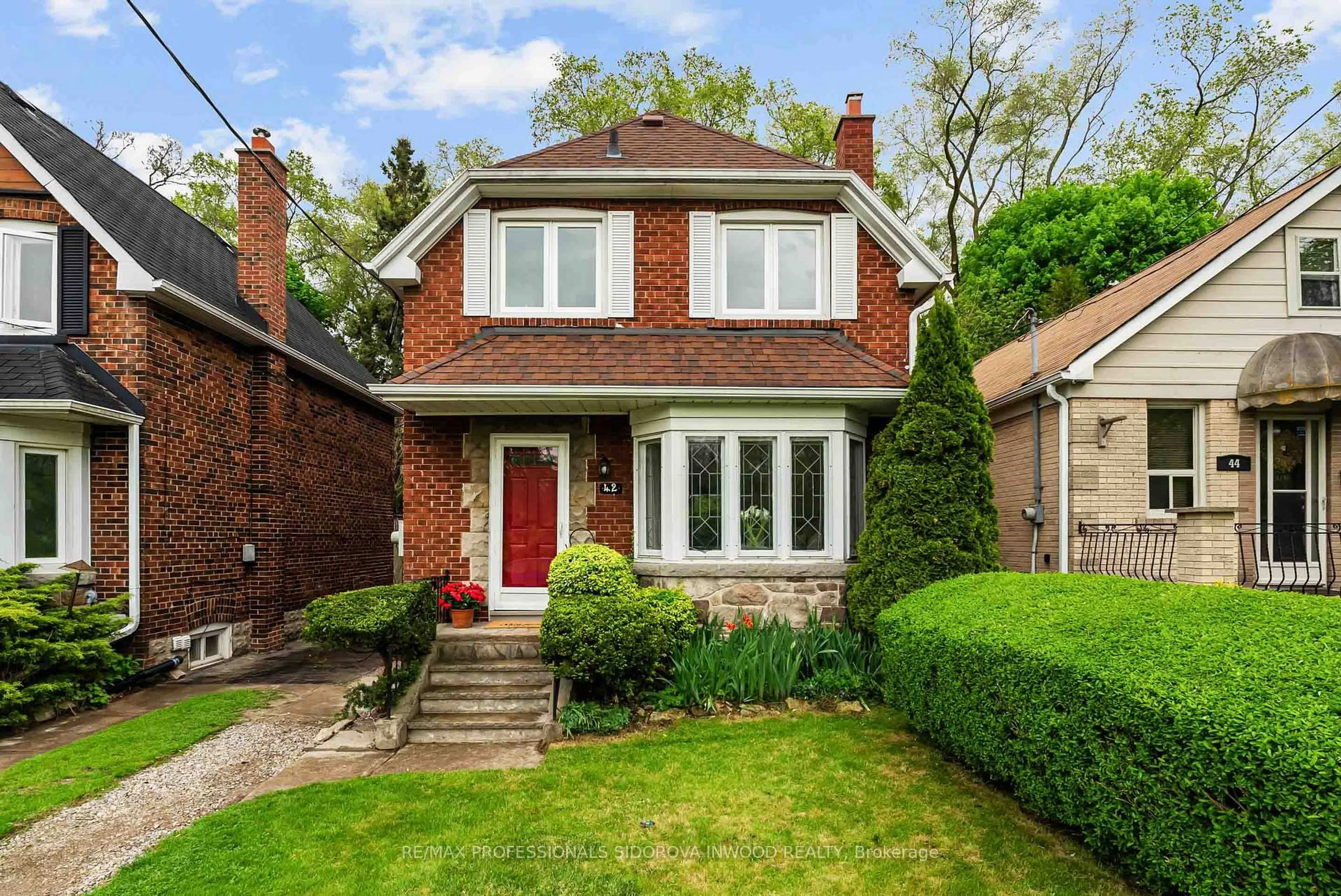 Home with brick exterior material, street for 42 Coe Hill Dr, Toronto Ontario M6S 3C8